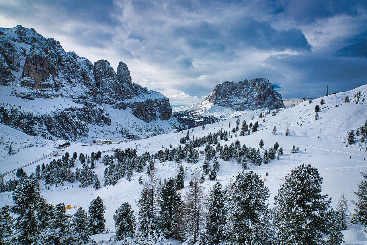Ski landscape, winter landscape, in Sella Val Gardena, Italy. Pine trees covered with snow. Winter in Italy.