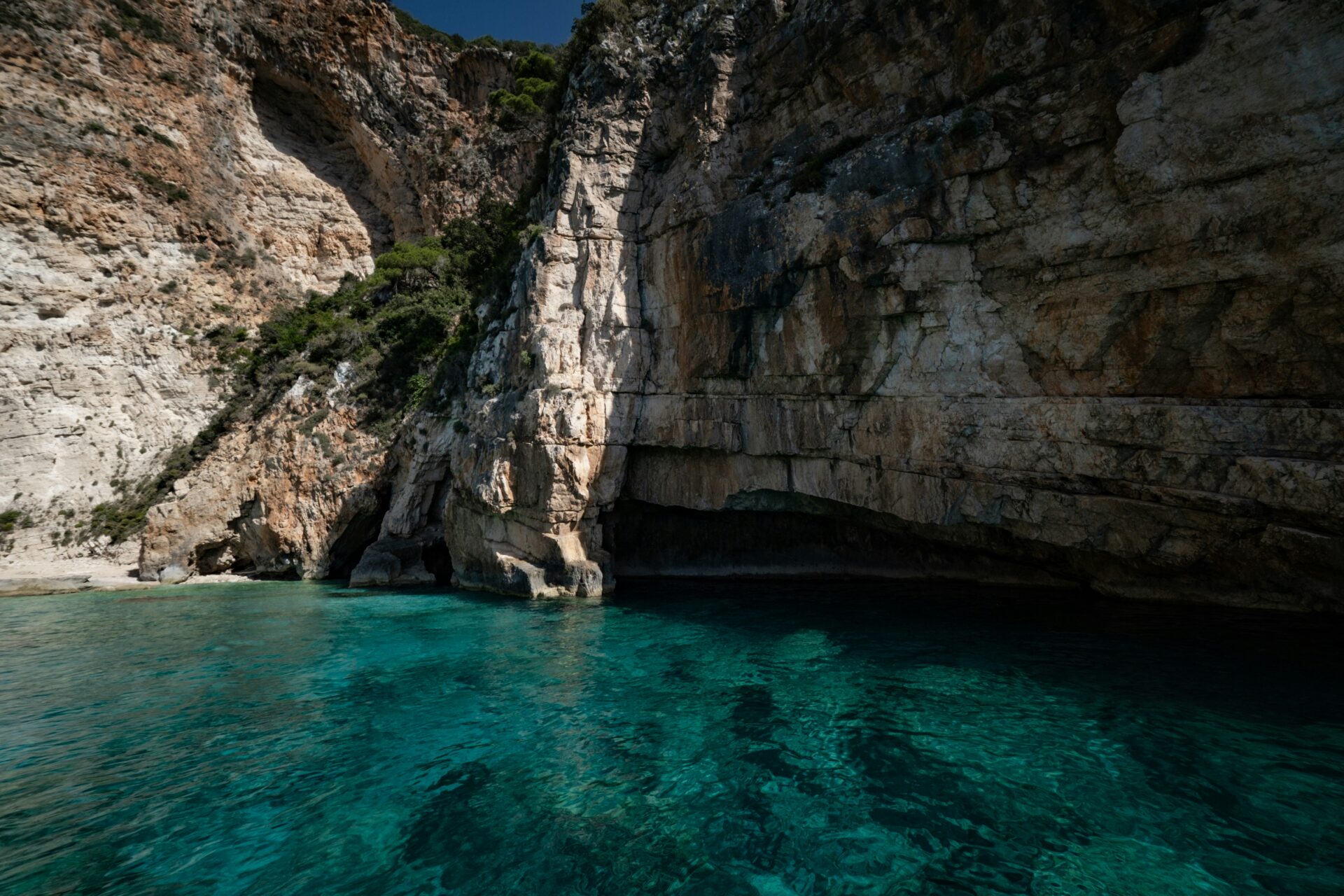 A lagoon with blue waters - cliff near the beach or sea - beach near Rome Italy