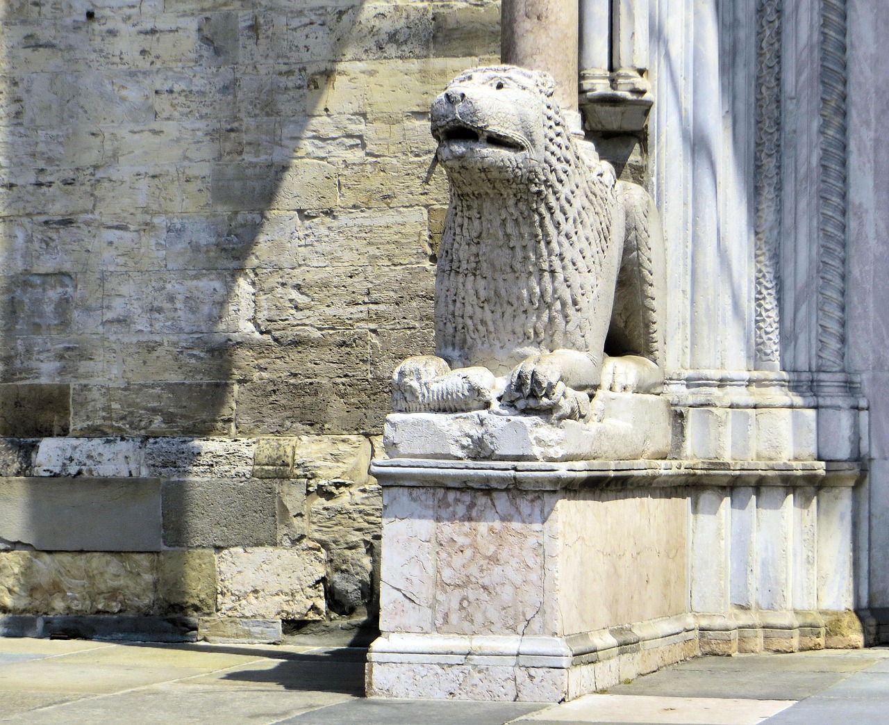 A lion statue in Cathedral of Parma