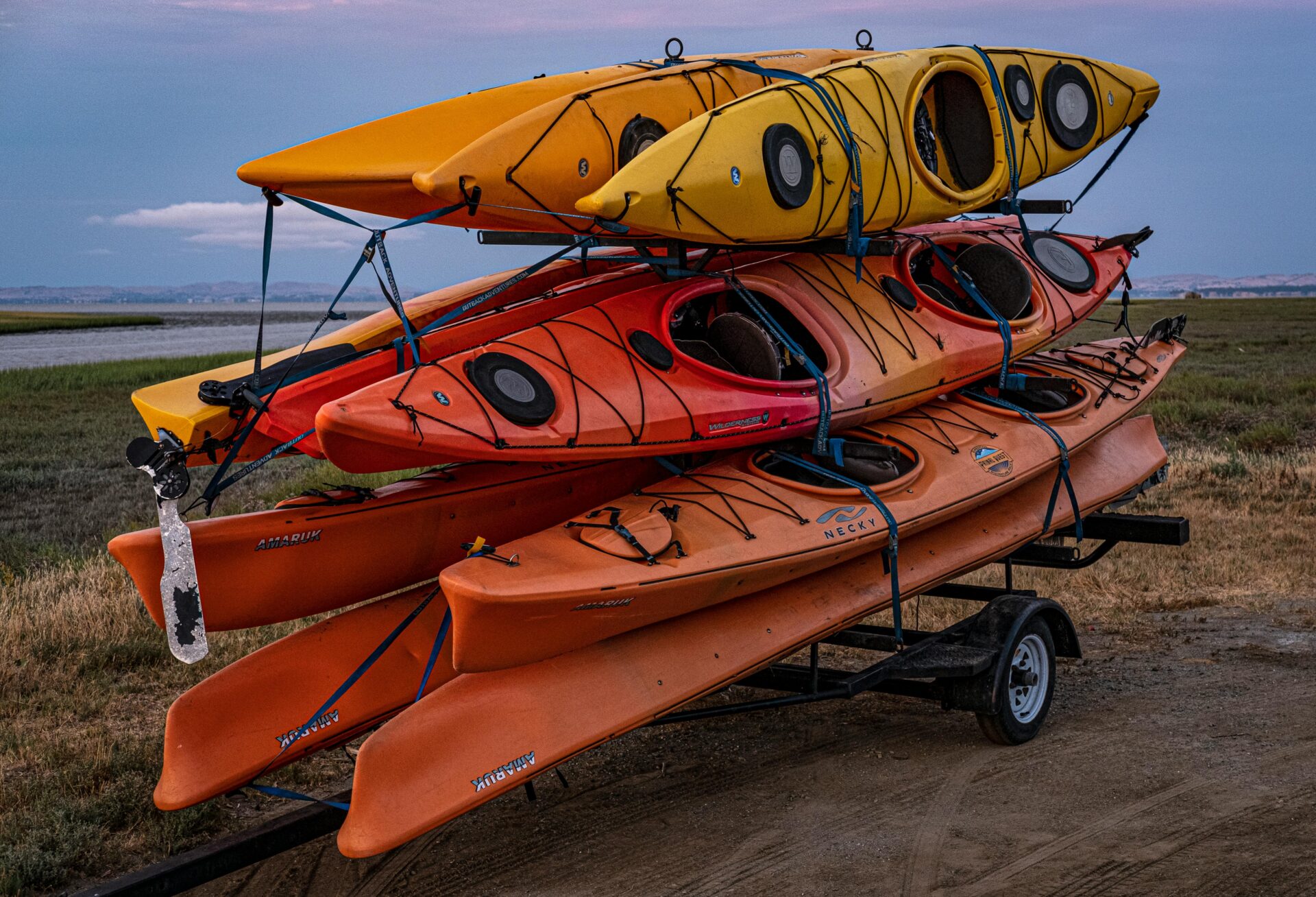 A pile of kayak baots