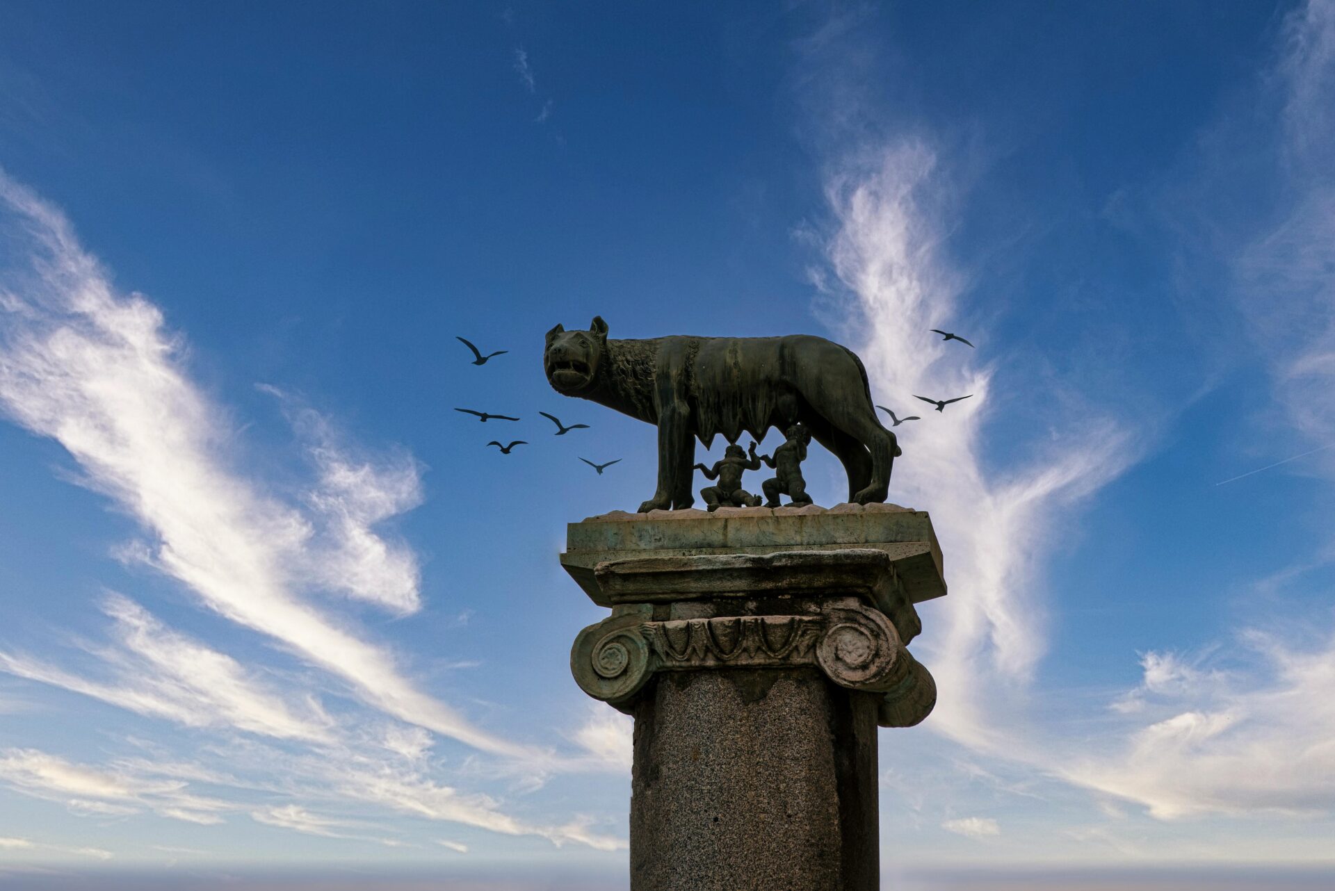 A statue of a She-wolf depicts the twins suckling