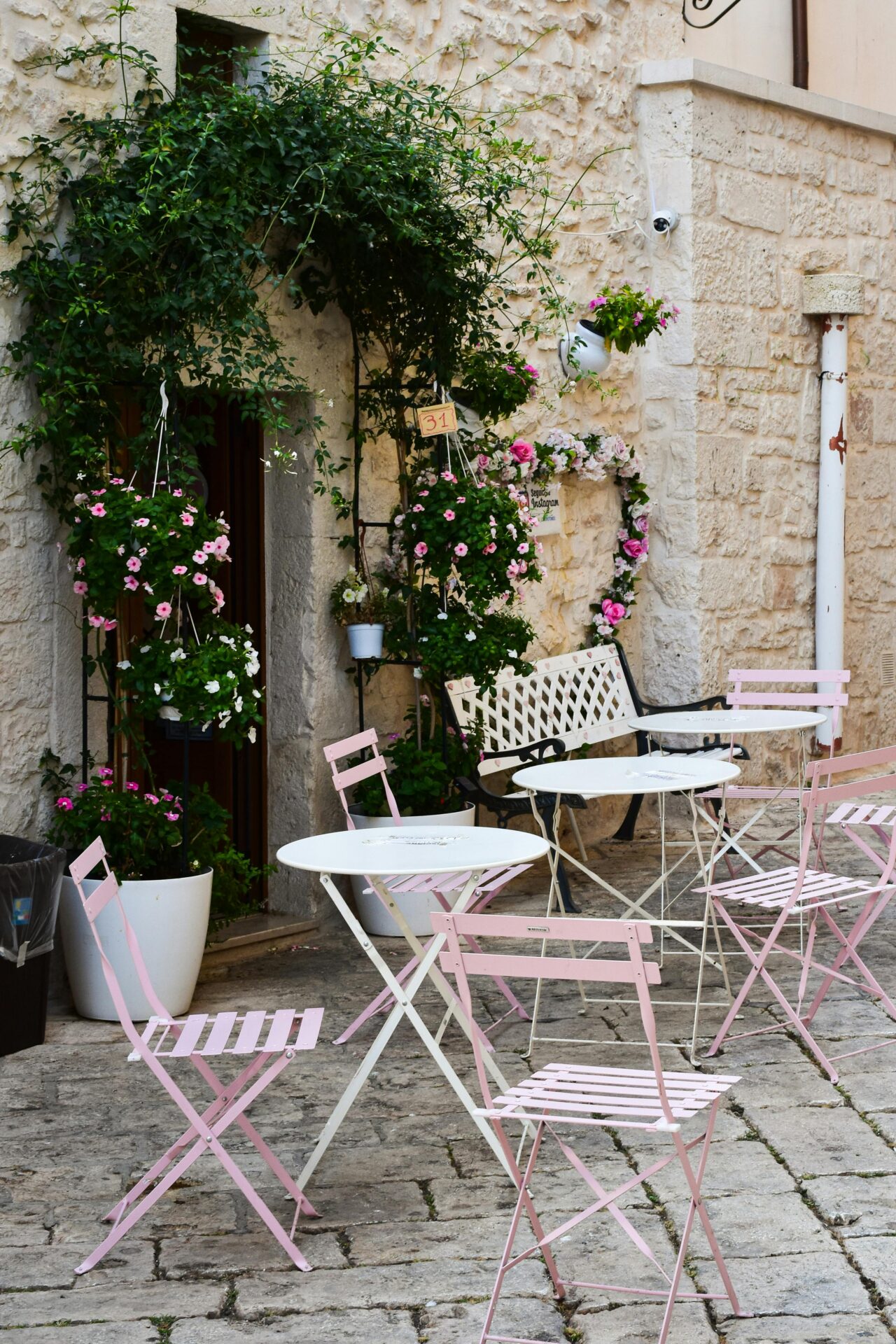 Daytime view of a charming café in Alberobello