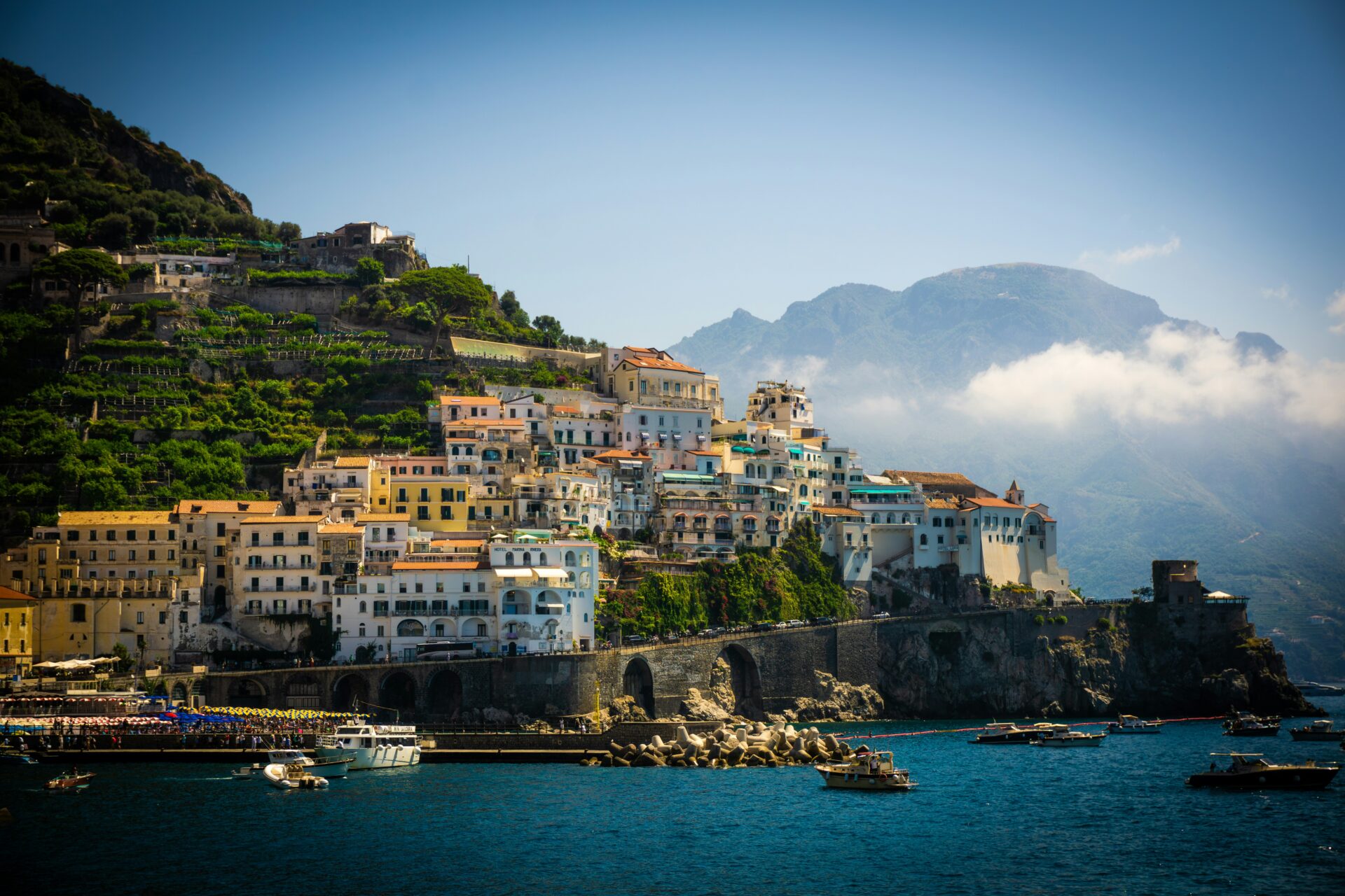 A breathtaking view of a charming coastal town perched on the cliffs of the Amalfi Coast in Italy.