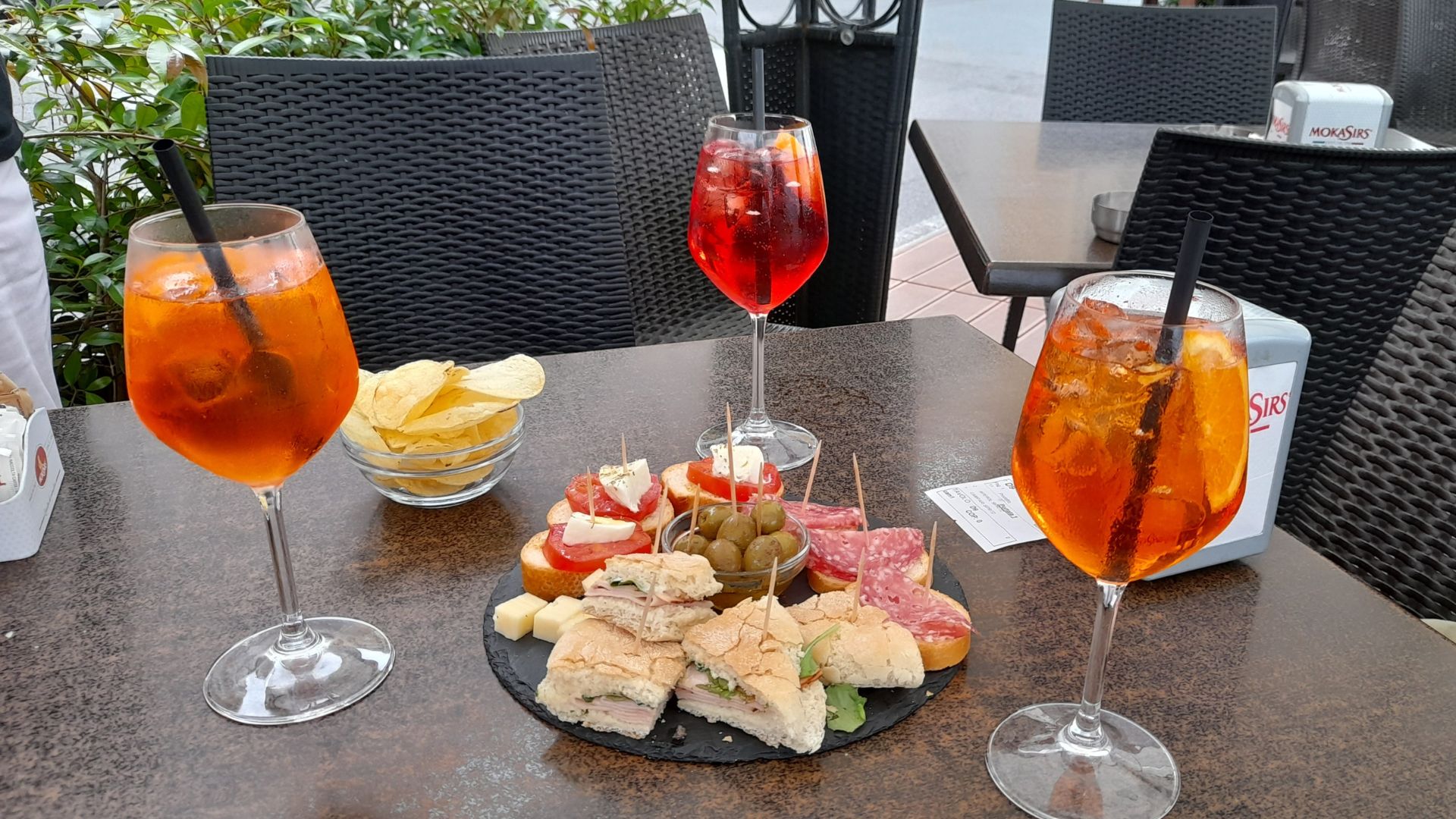 Image shows Aperitivo with some foods.