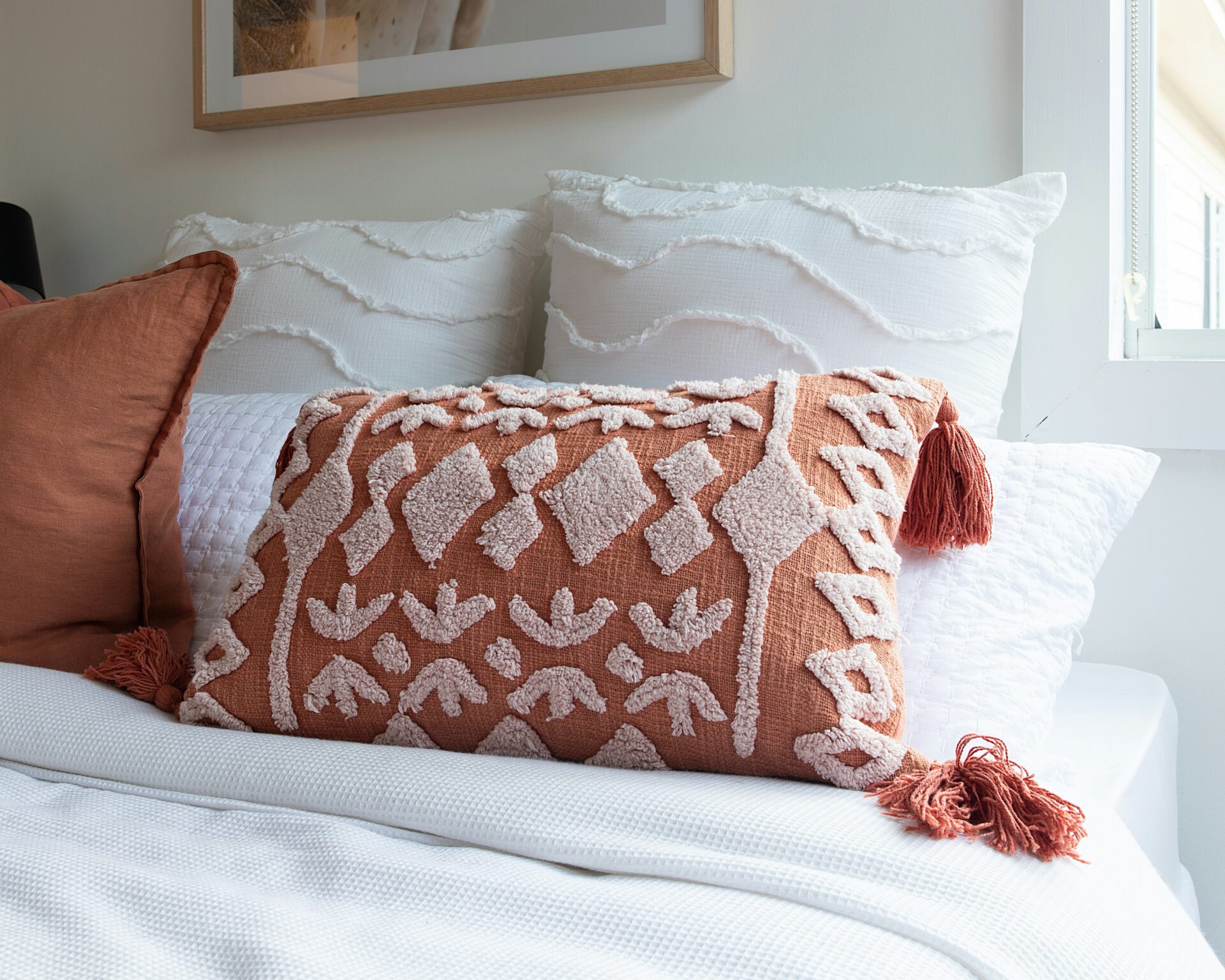 Bedroom with throw pillows and pillows - hotel bedroom