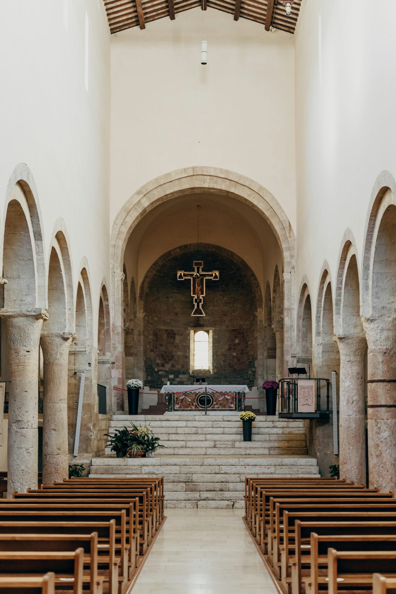 Interior of Bevagna Cathedral showcasing its Romanesque architecture