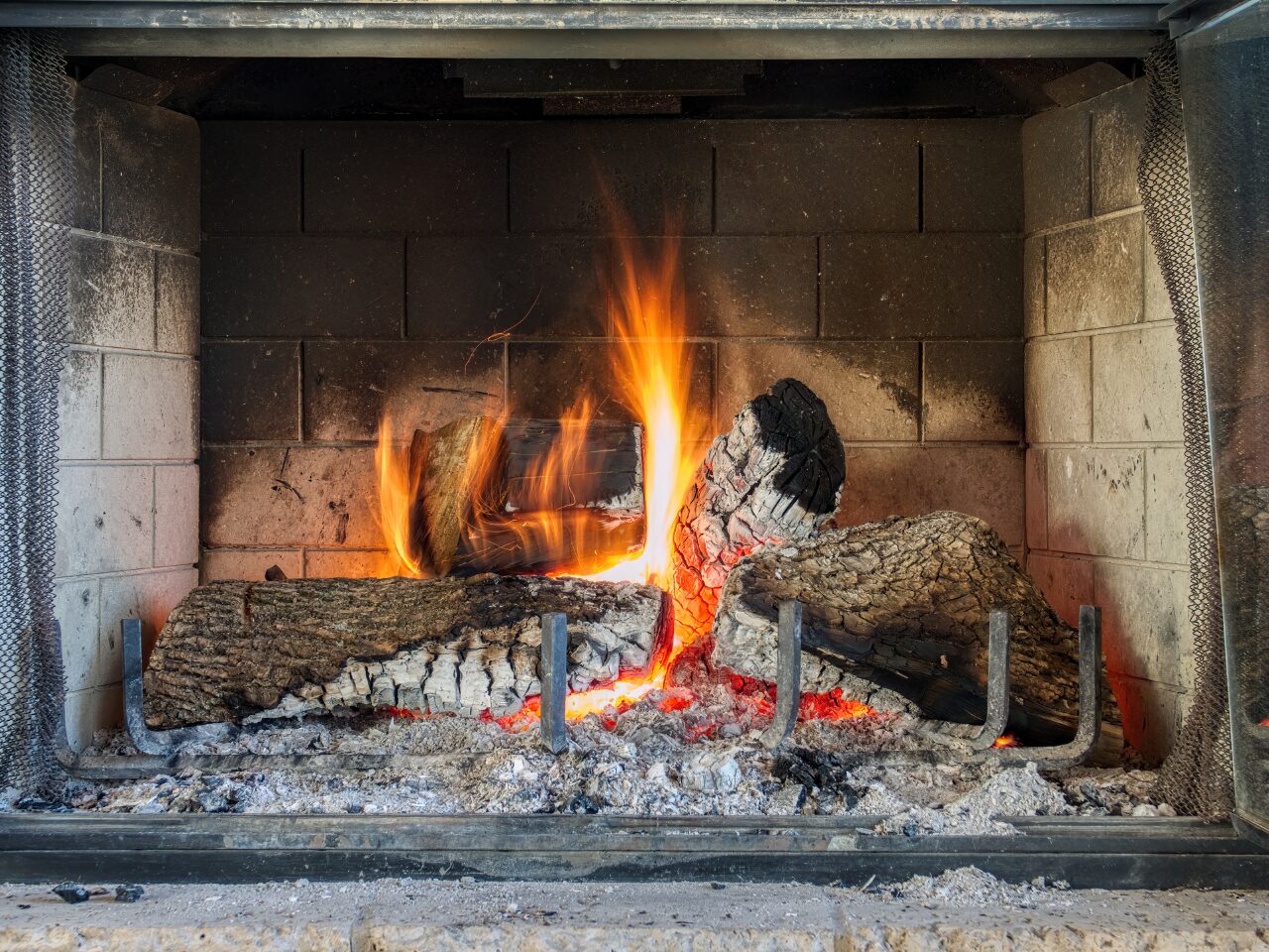 Burning firewood in a fireplace (hearth)