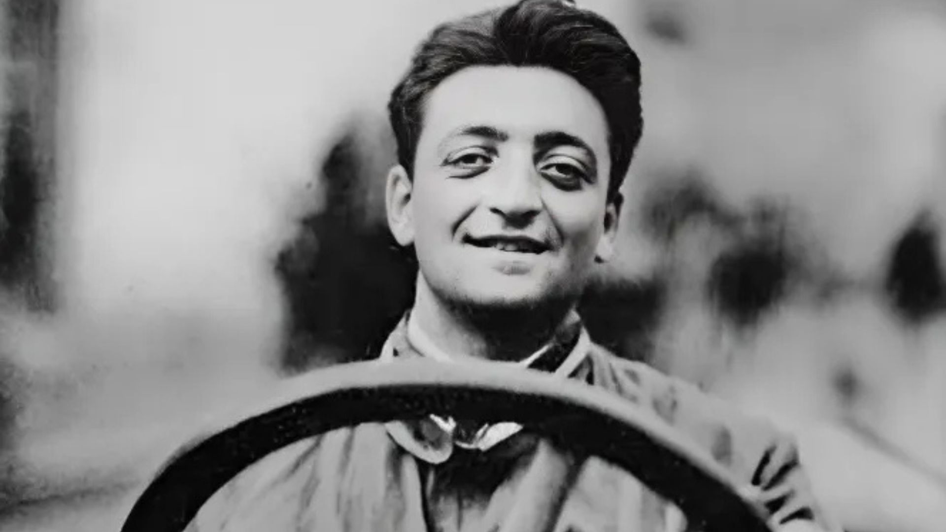 Photo of younger Enzo Ferrari.