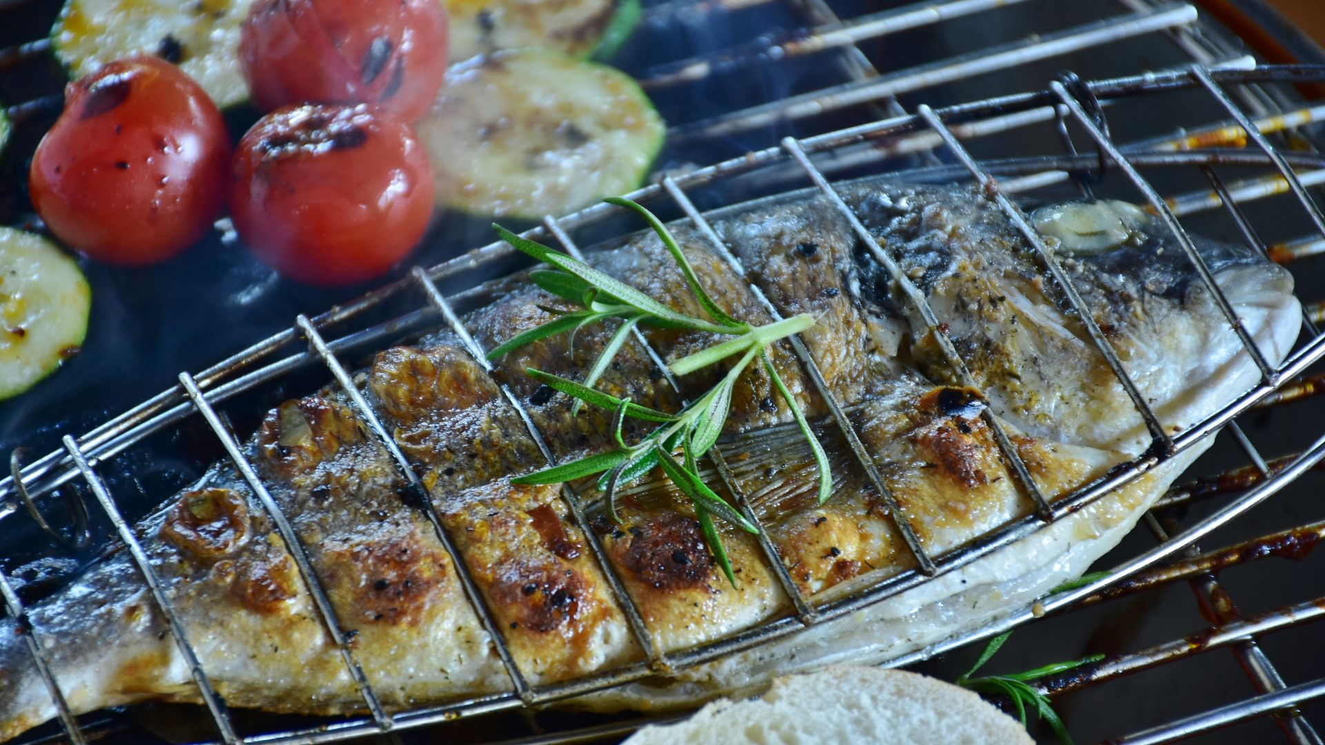 Image shows Grilled Fish wit herbs.
