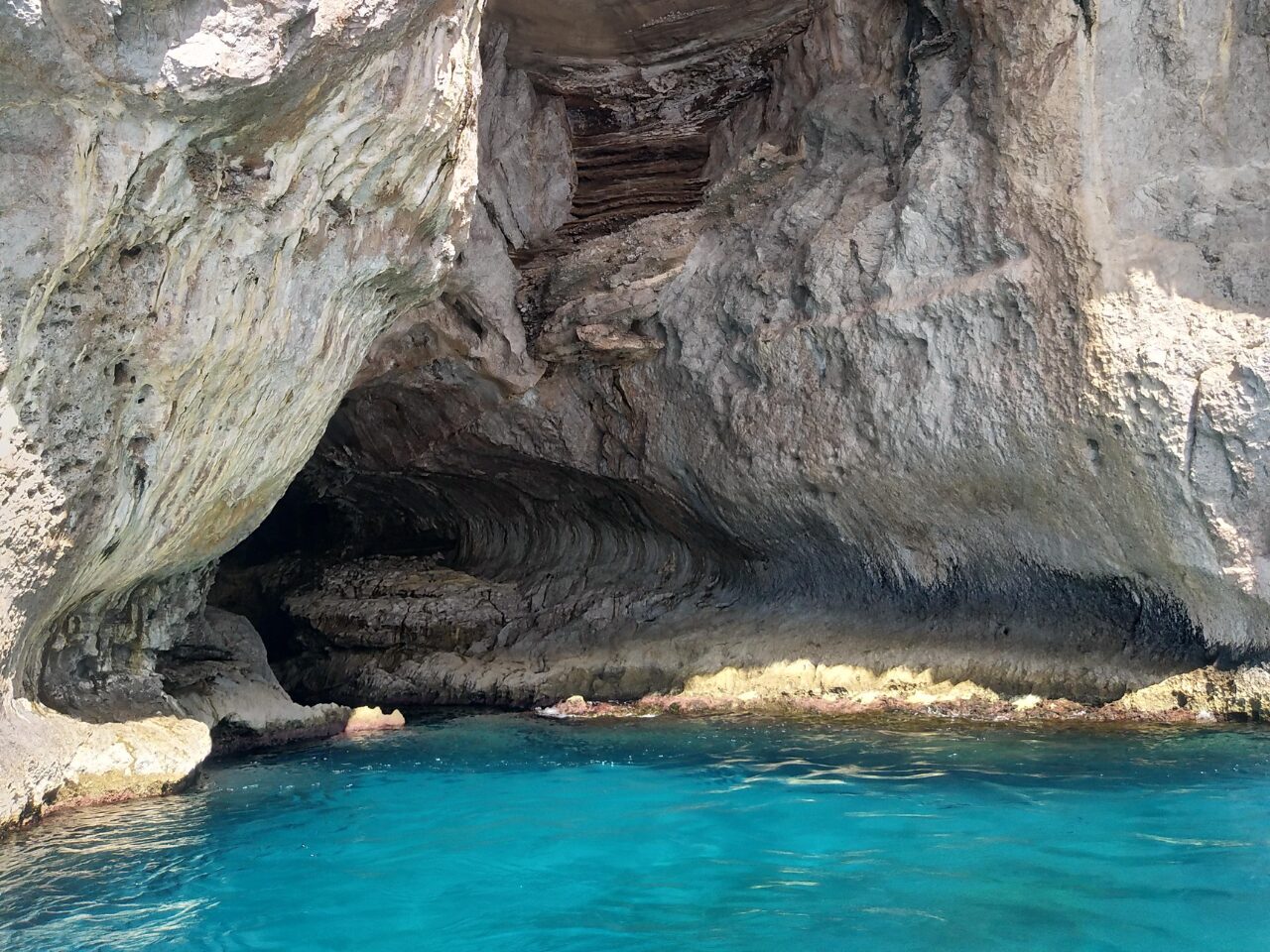 Grotto or cavern with crystal blue waters