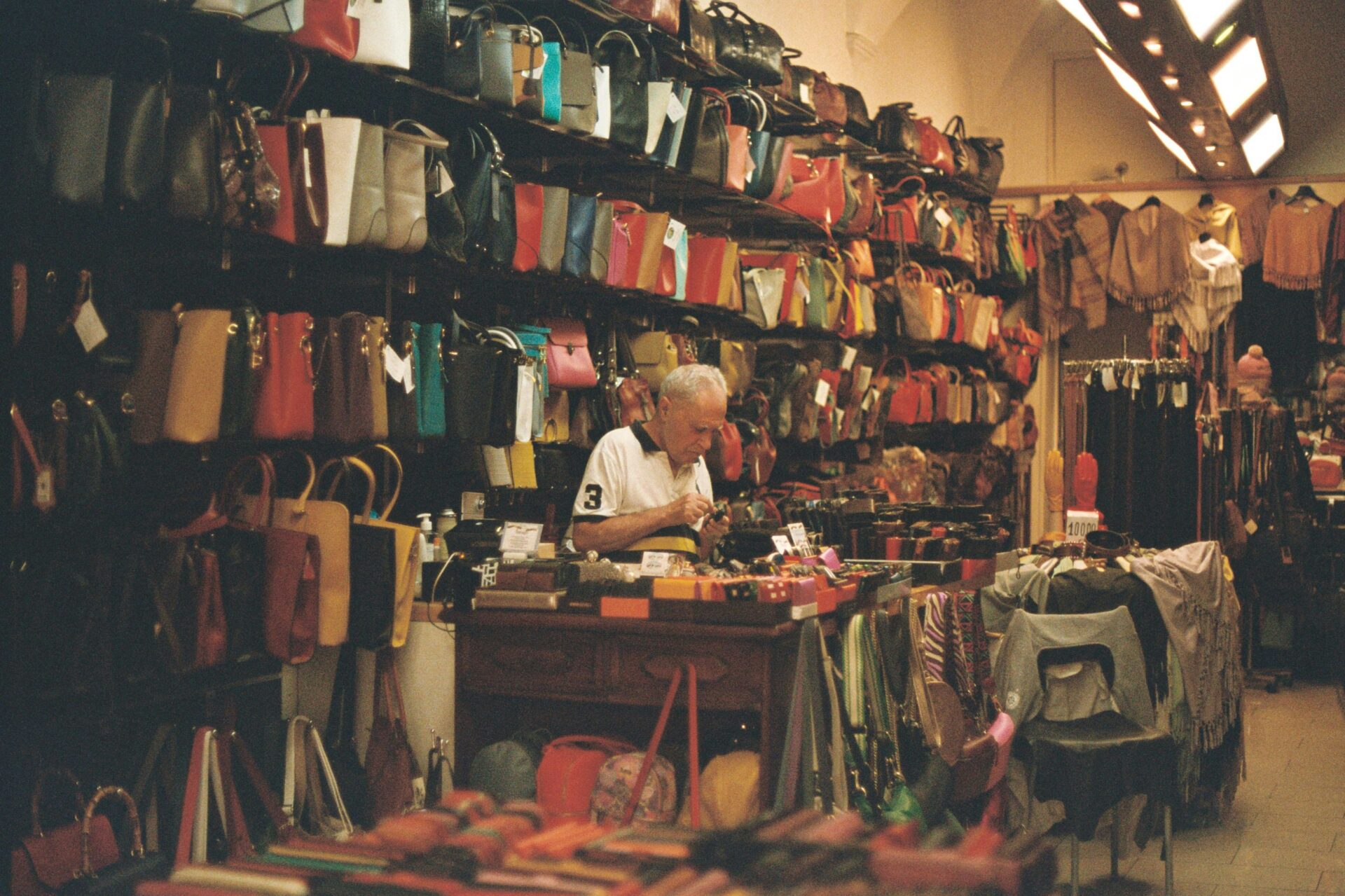 Leather shop in Florence featuring a man making leather-made products