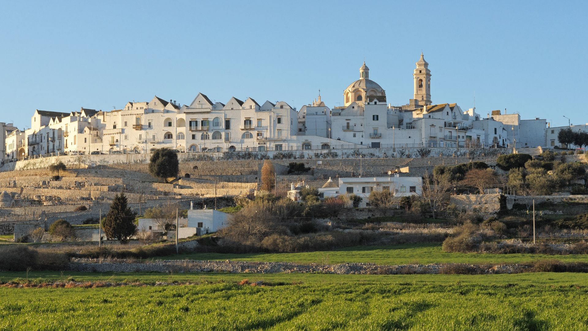 Image shows Locorotondo, Itria Valley of Puglia, Italy.