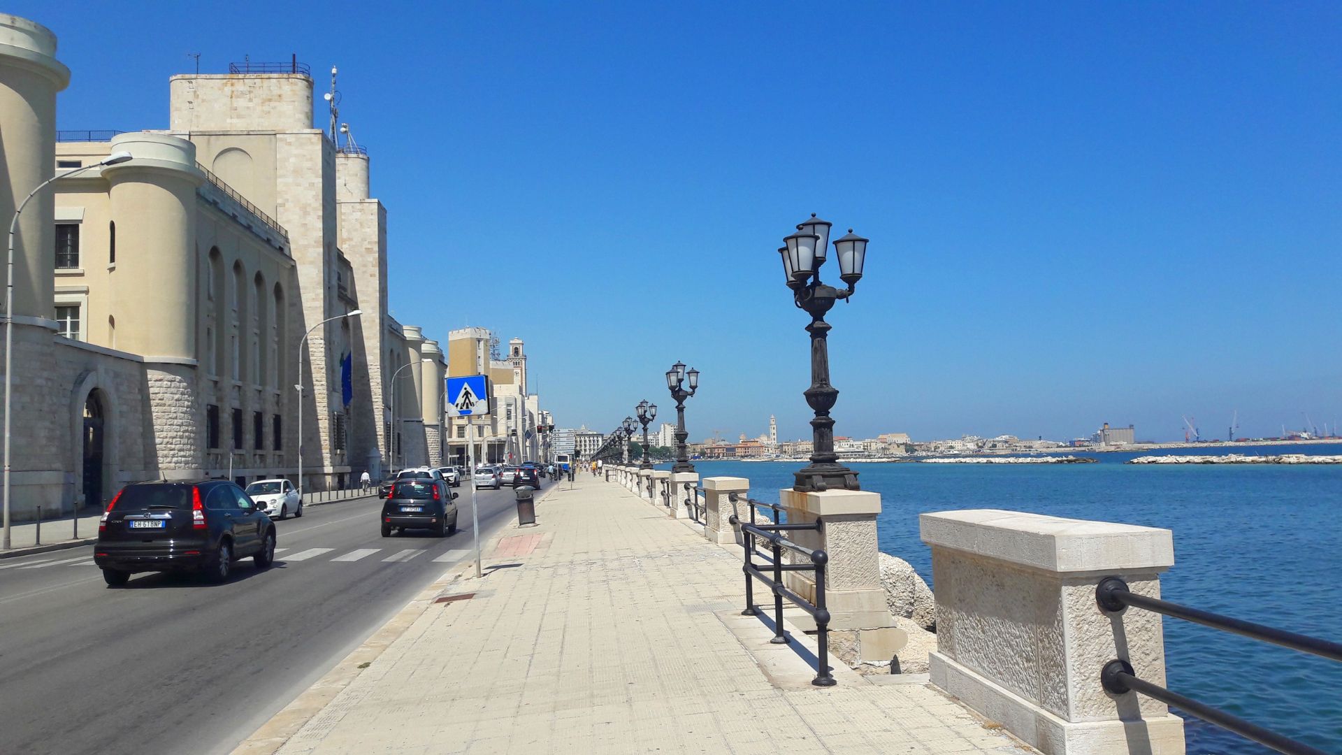 The image shows the waterfront promenade Lungomare Nazario Sauro, Bari Vecchia, Italy.
