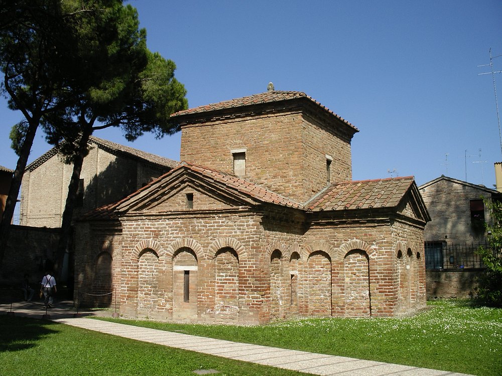 The Mausoleum of Galla Placidia in Ravenna, Italy, showcasing its stunning Byzantine architecture and intricate mosaic-adorned ceilings.