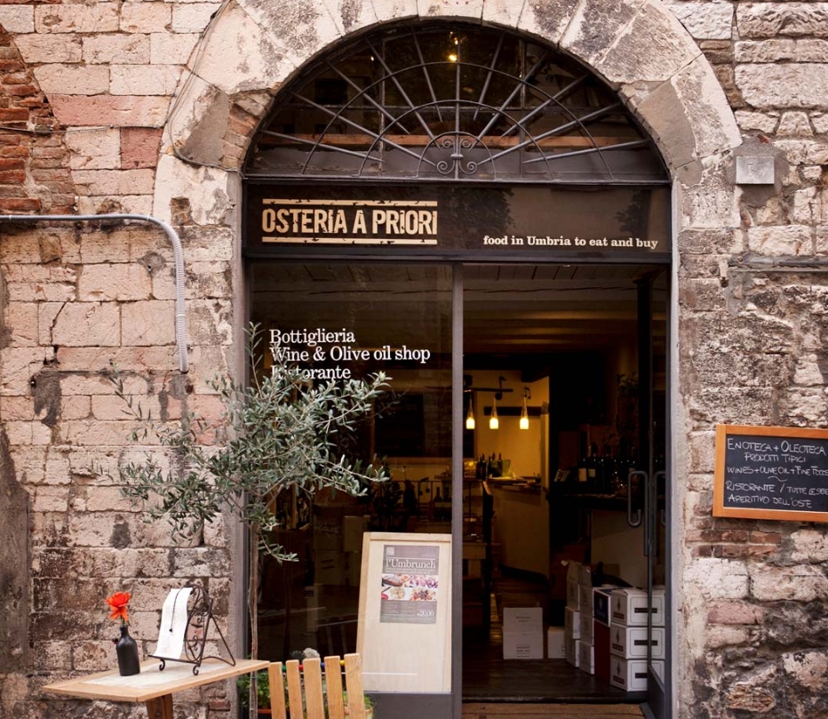 Osteria a Priori in Perugia, Italy – a cozy, rustic restaurant serving traditional Umbrian cuisine with local wines and artisanal ingredients in a historic setting on Via dei Priori.