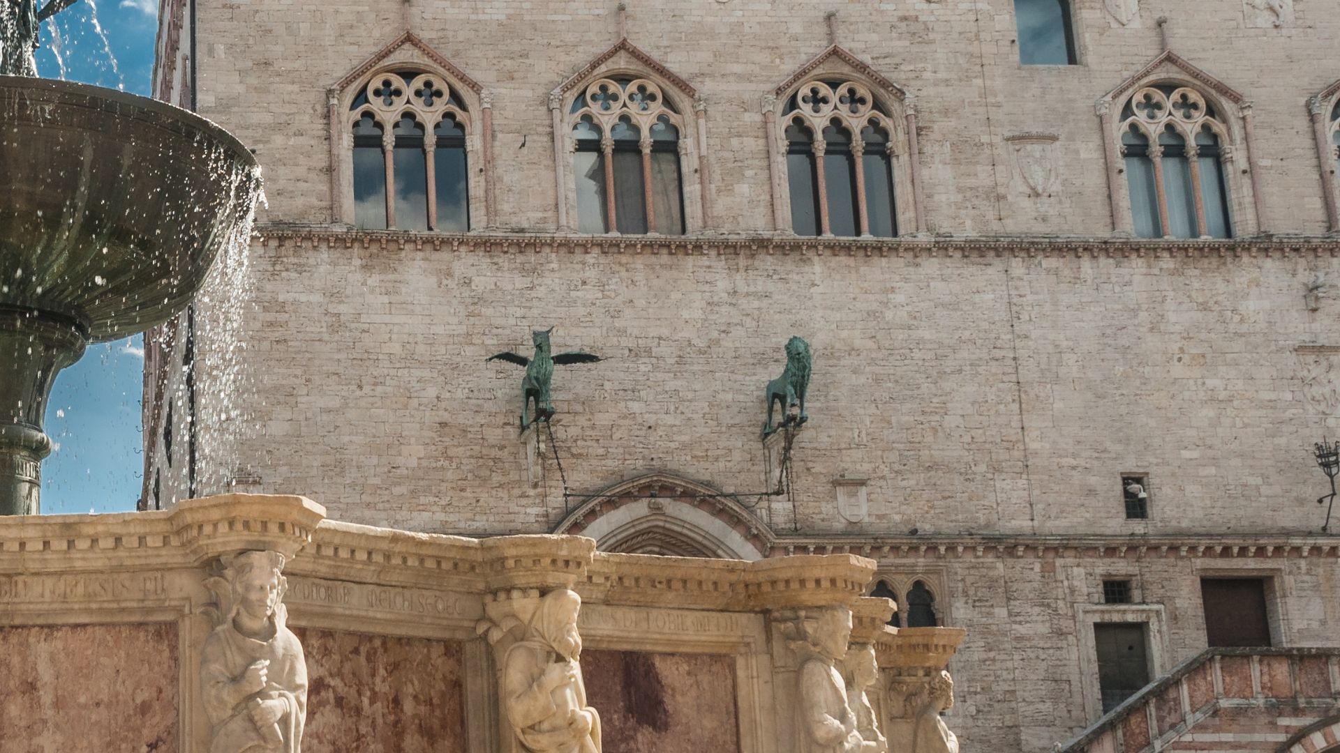Close up image of griffins and lions  in Palazzo dei Priori. 