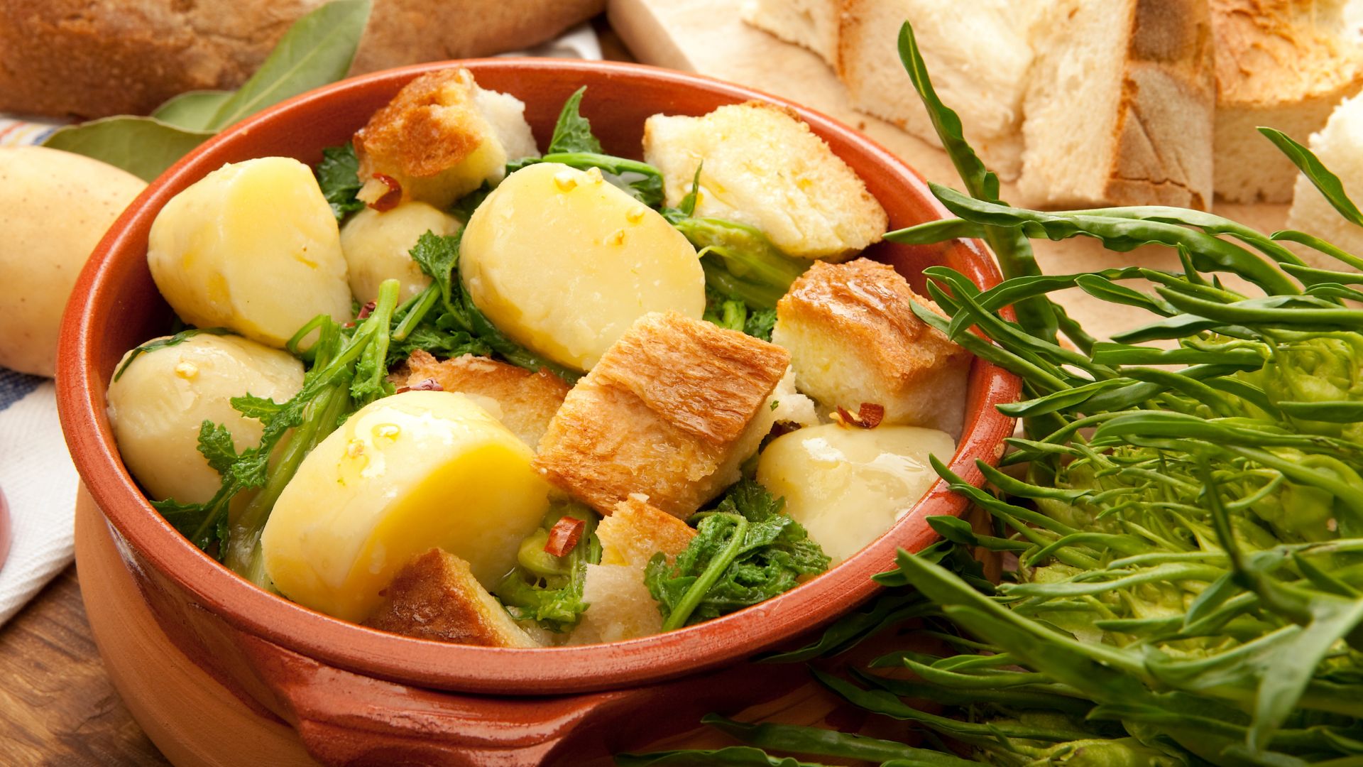 The image shows Pancotto Garganico, a traditional dish from the Gargano area of Italy. Pancotto is a soup made with stale bread, vegetables, and herbs.