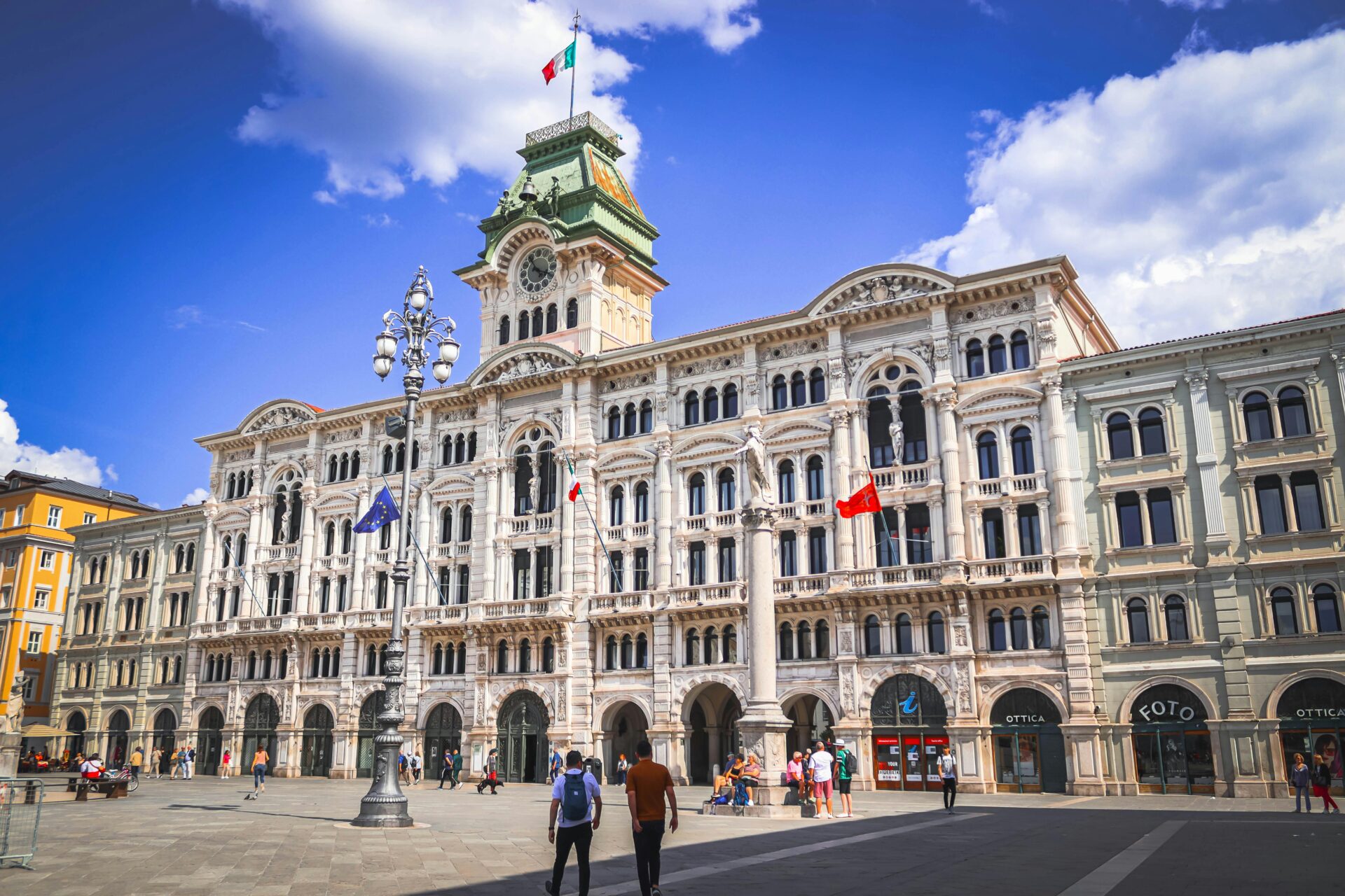 Front view of Piazza Unità d'Italia during the day.