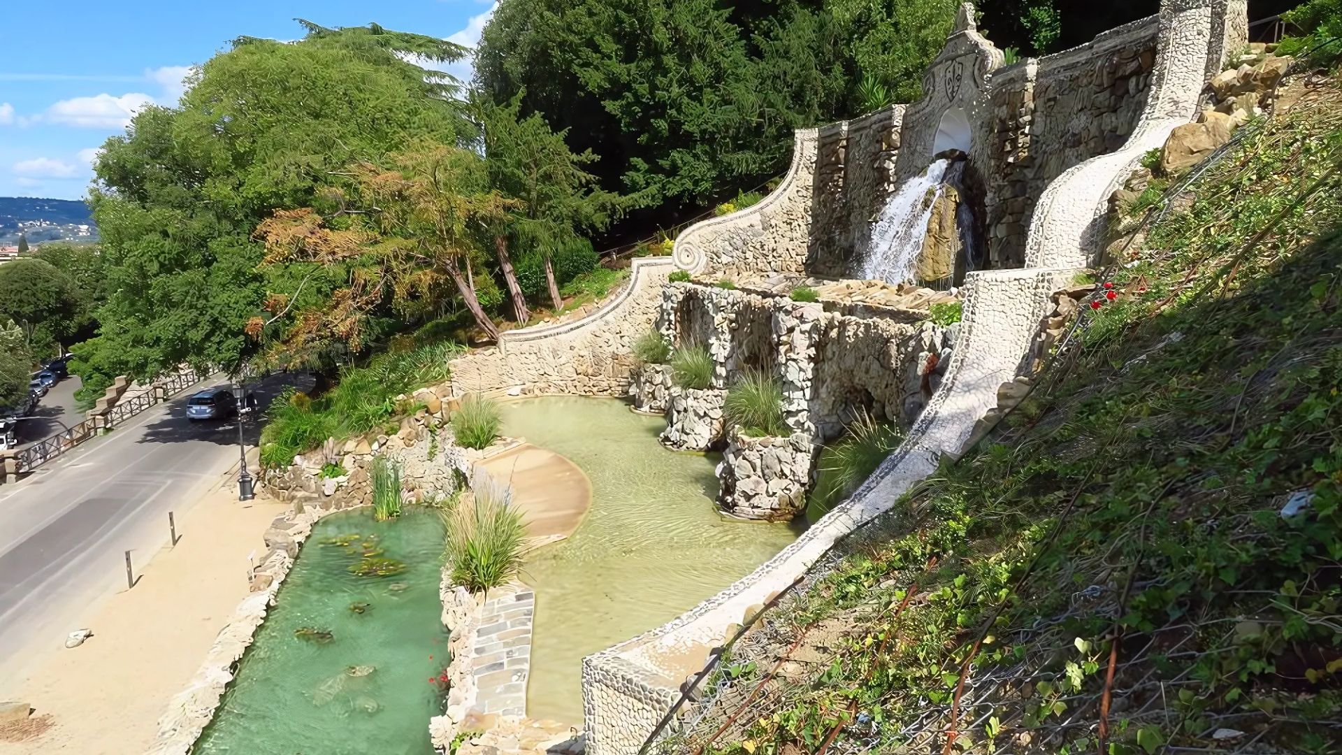 The image shows the Sistema delle Rampe del Poggi, also known as the Fontane delle Rampe del Poggi, located in Florence, Italy