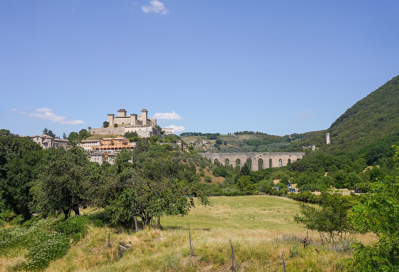 Majestic Ponte delle Torri aqueduct bridge spanning the forested gorge in Spoleto, Umbria, Italy.