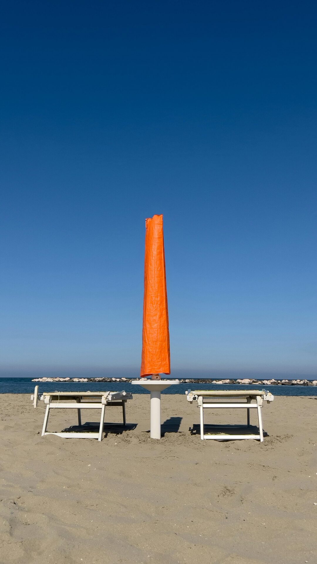 Scenic view of the Ravenna coastline with sandy beaches, calm Adriatic Sea waves
