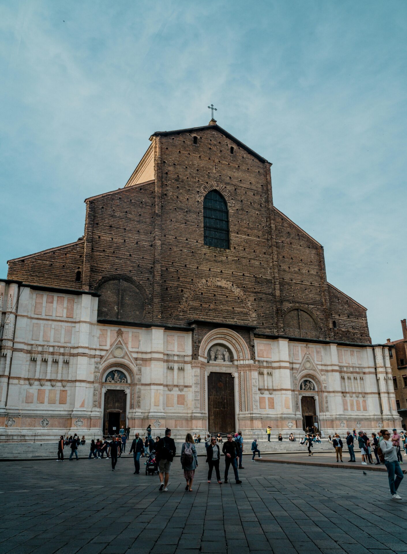San Petronio Basilica in Bologna, Emilia-Romagna, Italy, featuring its grand unfinished façade and impressive Gothic architecture in the heart of Piazza Maggiore
