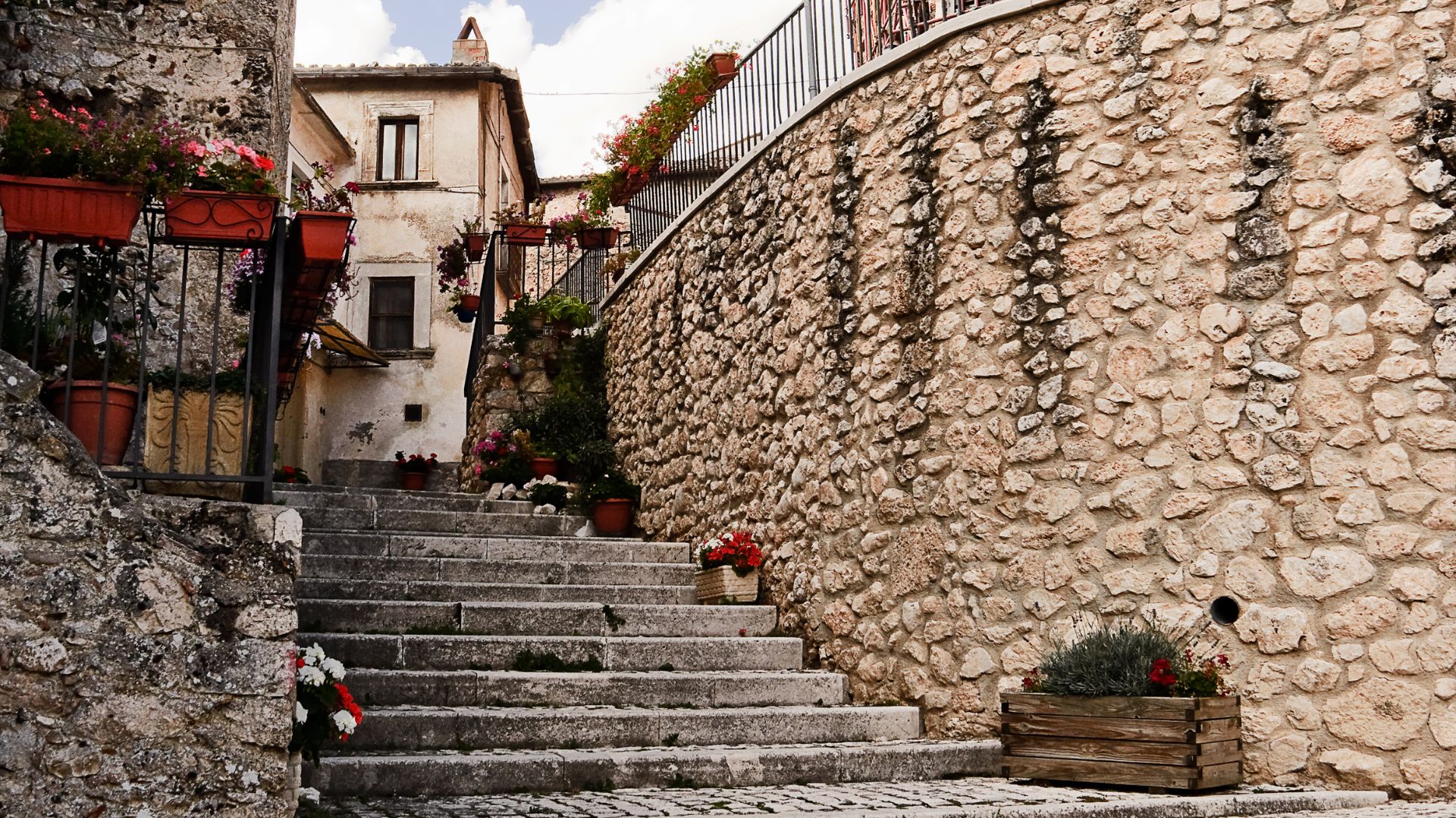 Image shows cobbled stairs of the town Santo Stefano di Sessanio