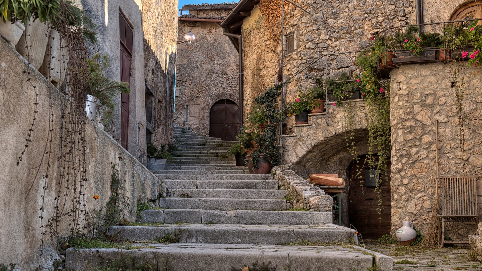 Image shows cobblestone streets in Santo Stefano di Sessanio
