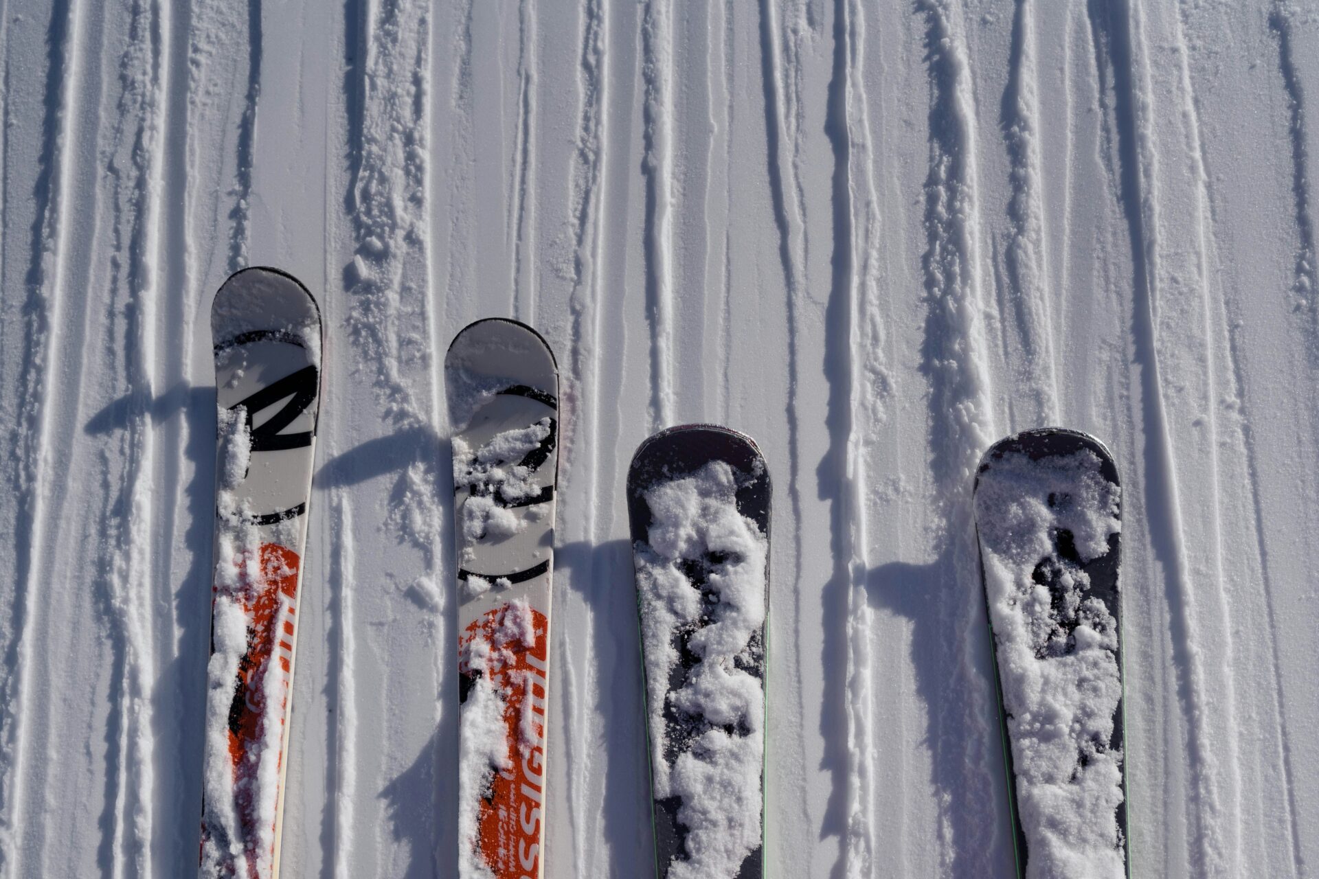 Skiing or snowboarding gear at a snowy ground