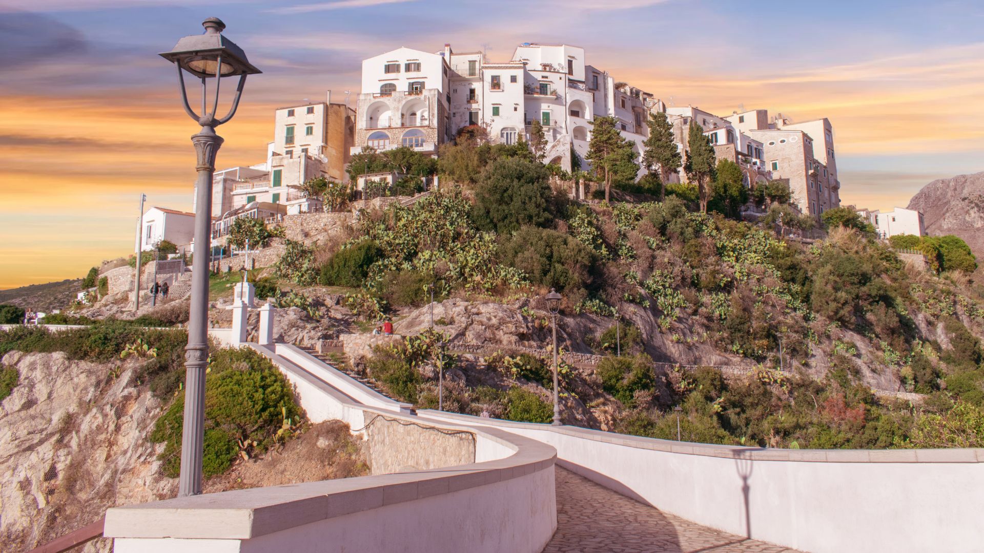 The image shows Sperlonga, Italy.