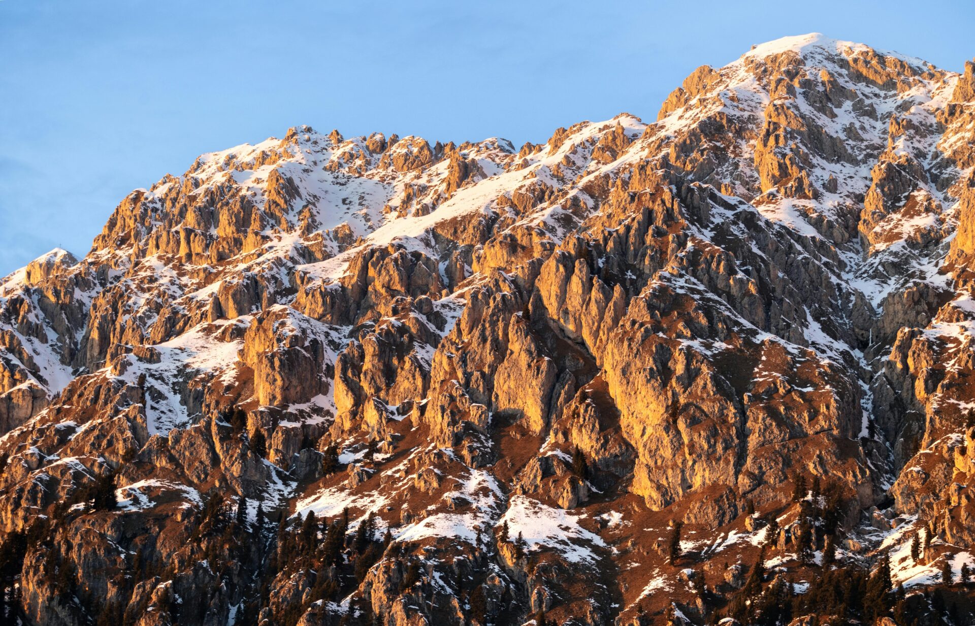 Stunning Sunlit Dolomites Peaks at Sunset
