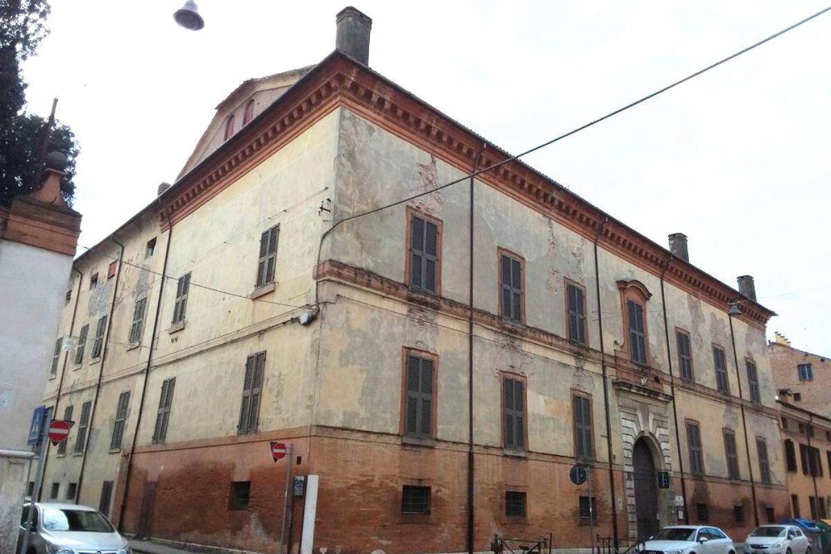 The building in the image is the State Archives of Ferrara, also known as Palazzo Penna, located in Ferrara, Italy.
