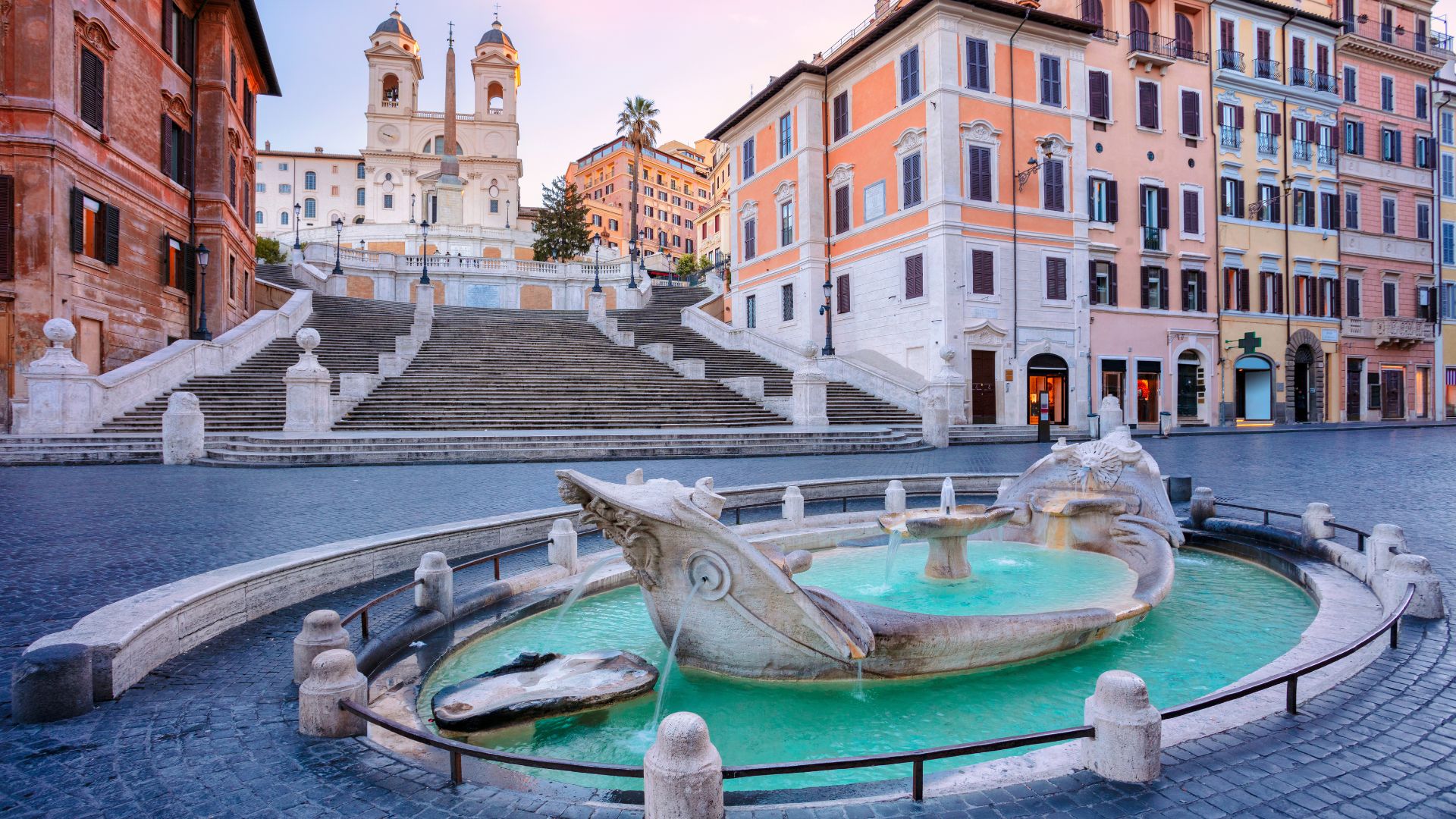 Image of The Fontana della Barcaccia showing Baroque-style fountain found at the foot of the Spanish Steps in Rome's Piazza di Spagna.