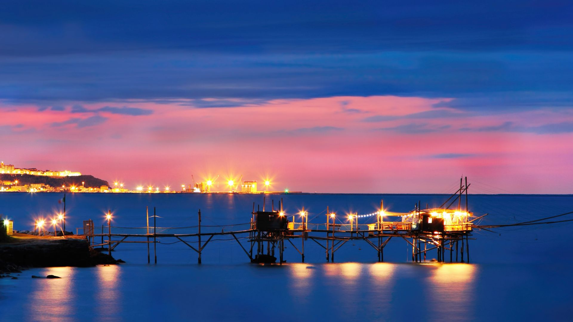 Image of a fishing platform during sunset at The Trabocchi of Abruzzo, Italy.