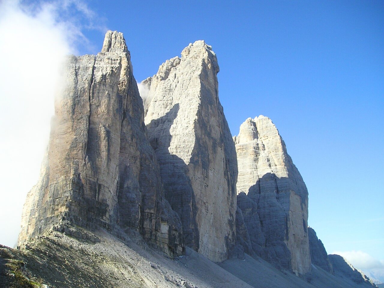 The Tre Cime Di Lavaredo Mountain Range in Italy with fog
