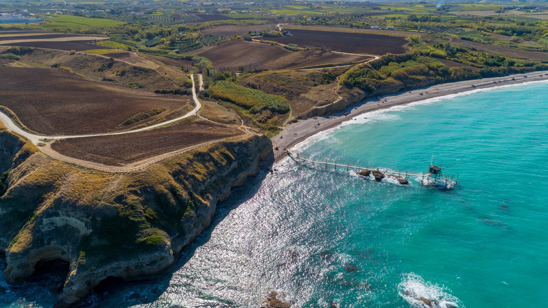 Image shows an aerial view of The trabocchi of Abruzzoa.