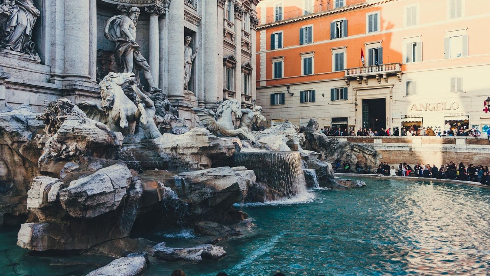 Image shows the Trevi Fountain, Rome