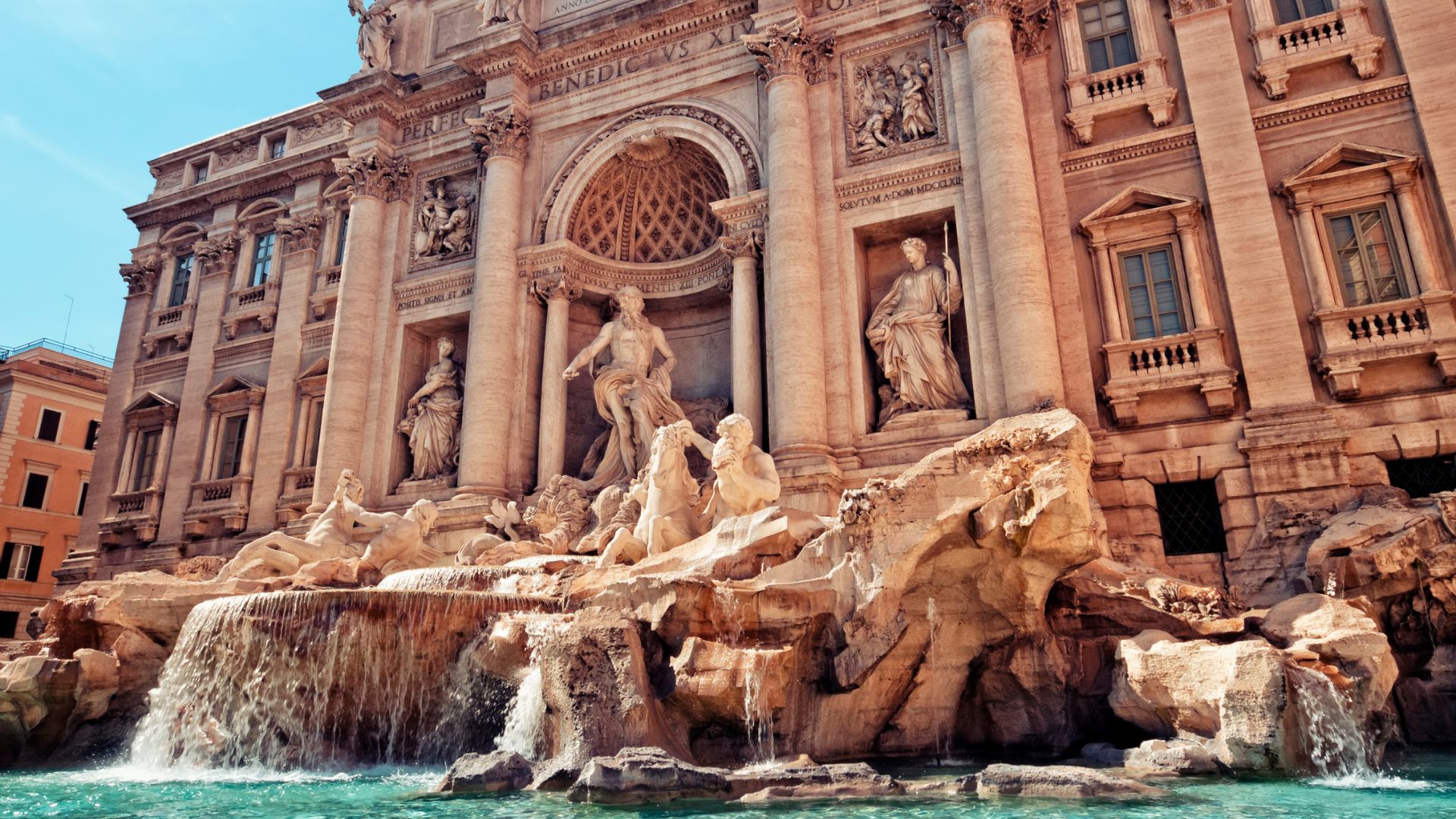 Image shows Trevi Fountain, Rome.