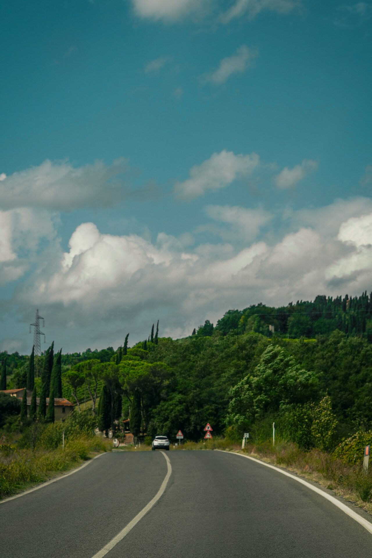 Winding country road through the Maremma region of Tuscany, Italy