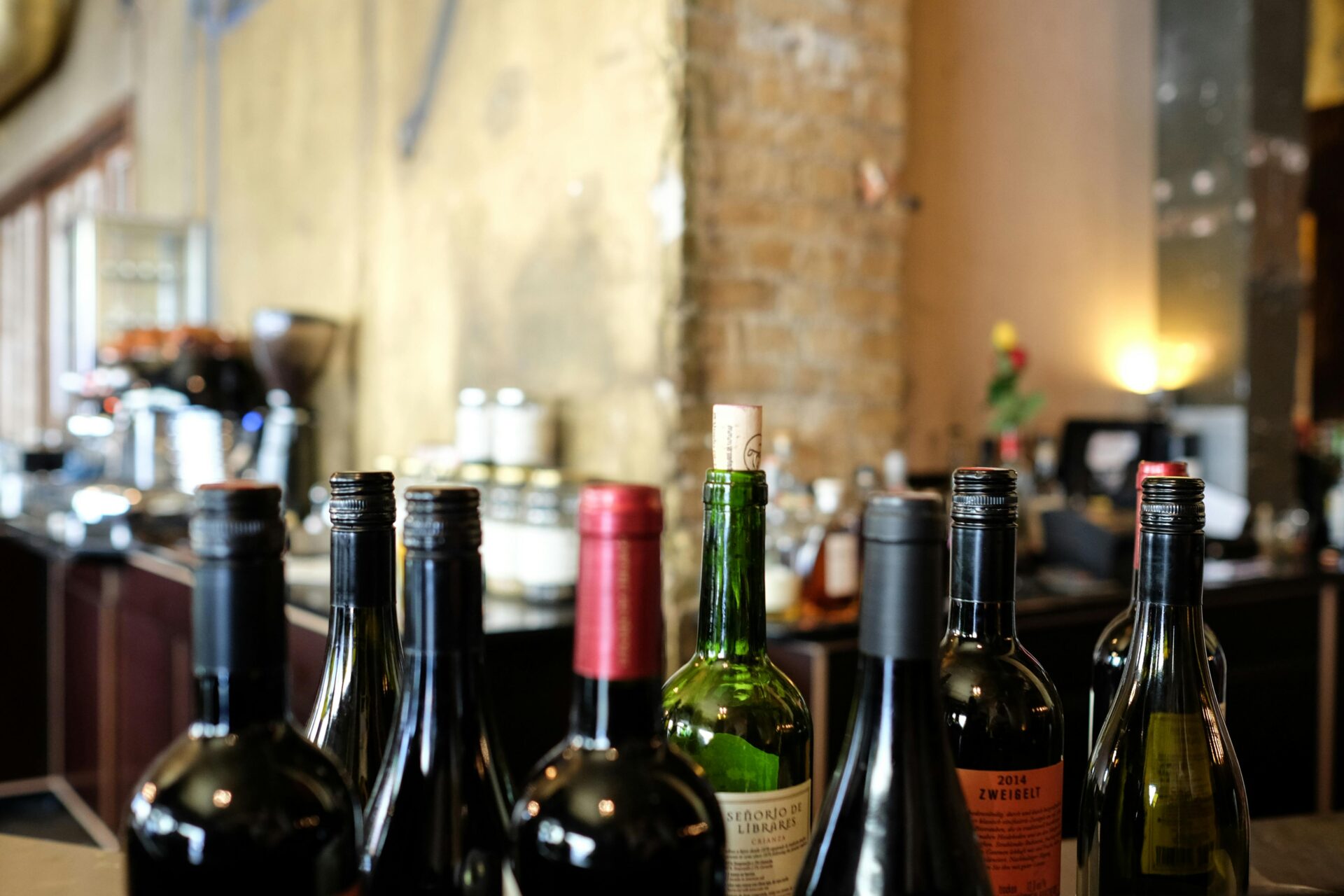 Wine bottles at a bar counter
