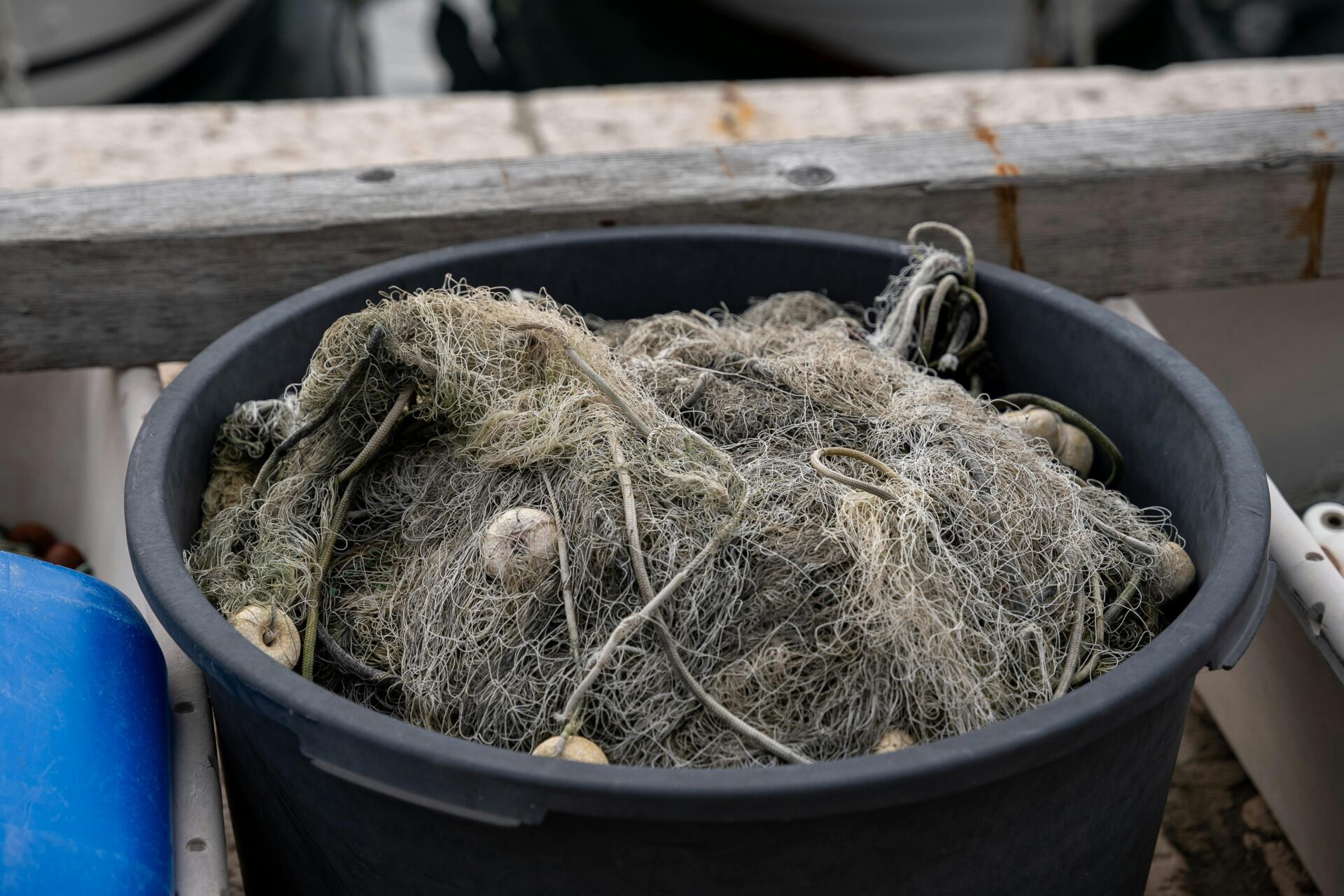 A Bucket with a Fishing Net