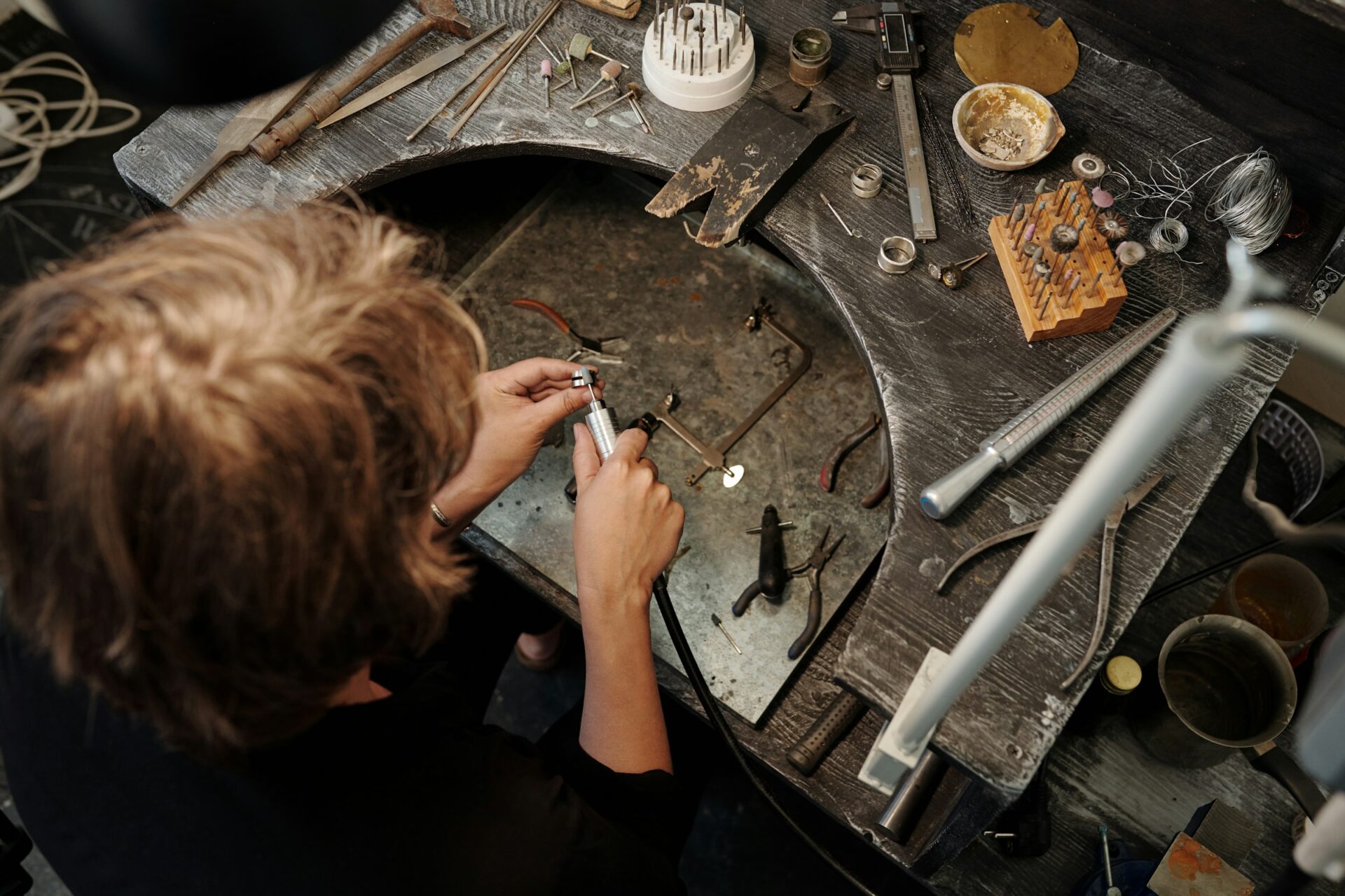 a woman crafting jewelry