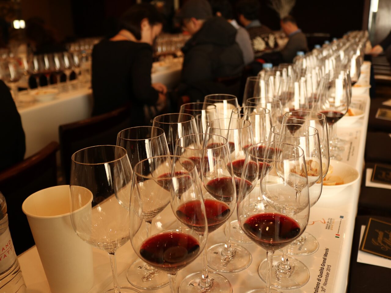 Wine tasting Italy - a restaurant table with several glasses of wine