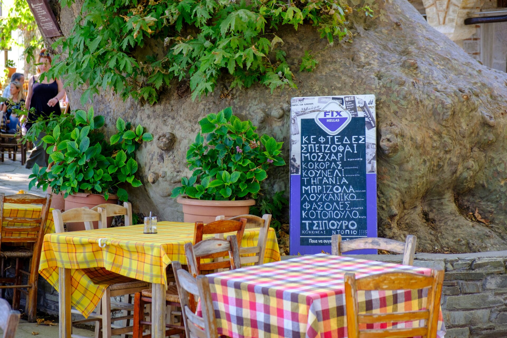 Al fresco dining tables in Greece