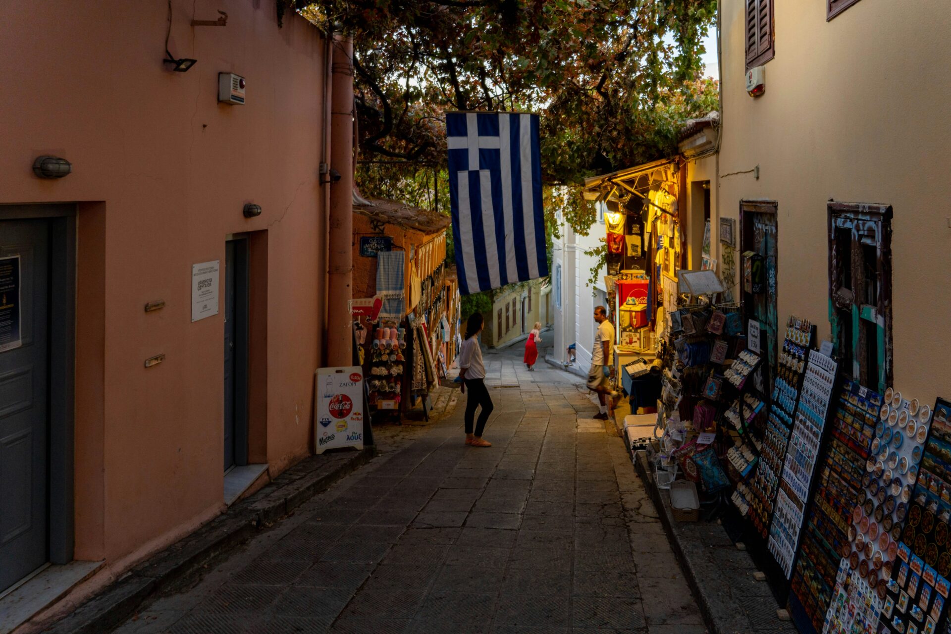 An alley with Greek flag and souvenirs for sale