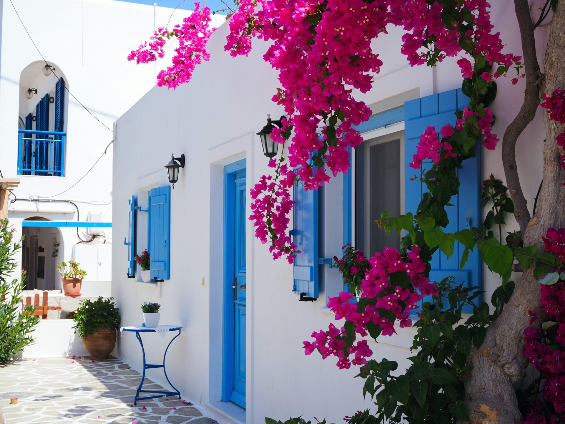White-washed house with blue door - Antiparos island, Cyclades, Greece