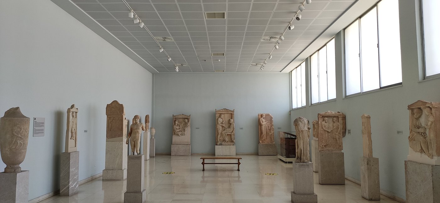 Ancient marble sculptures and grave reliefs on display at the Archaeological Museum of Piraeus, Greece.