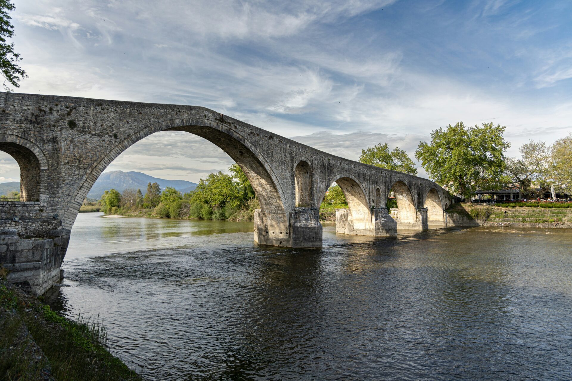Close-up of the Arta Bridge’s stonework and central arch