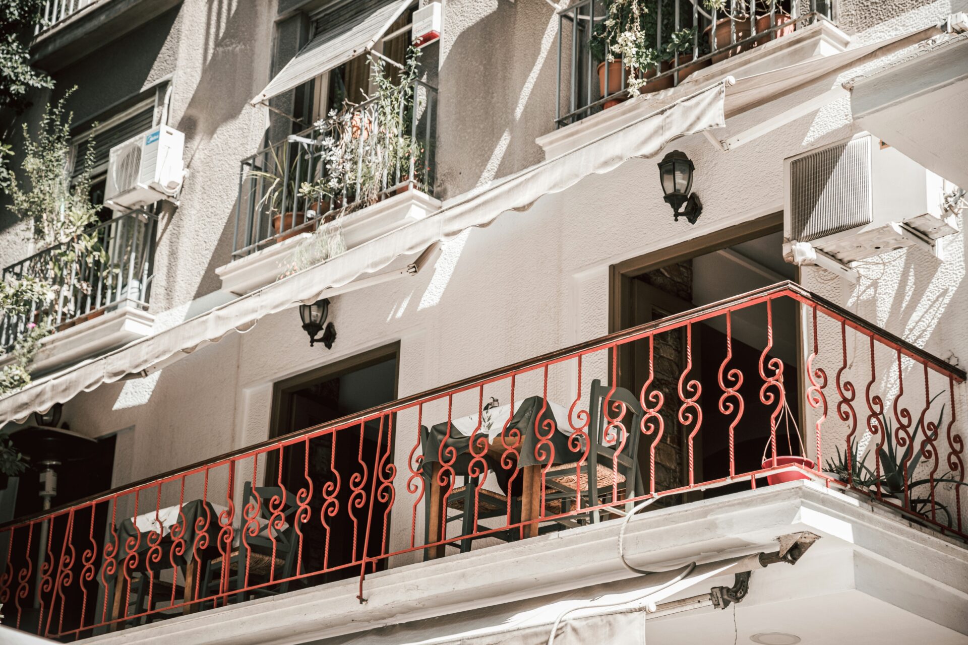 Balcony of a white-washed house in Athens, Greece