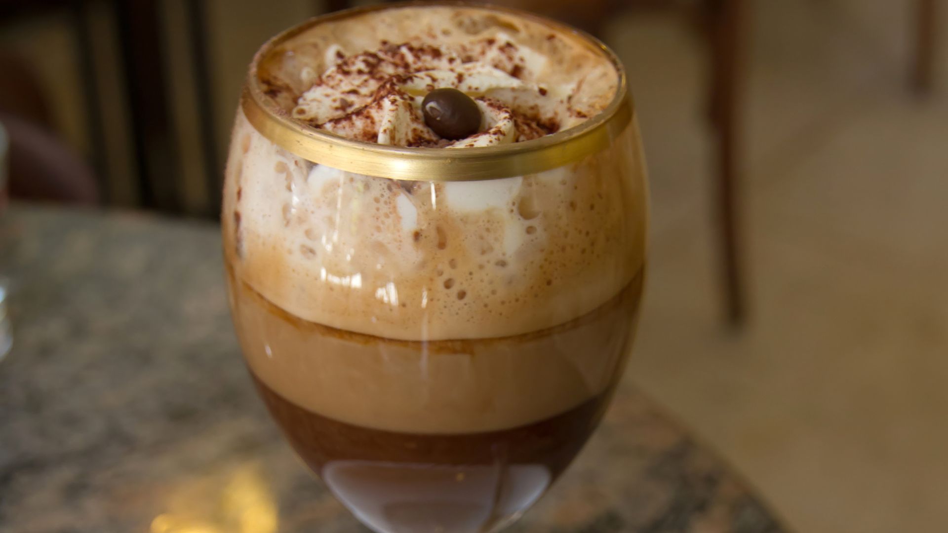 Bicerin, layered ingredients of ganache (a type of thick hot chocolate), espresso, and frothed milk.